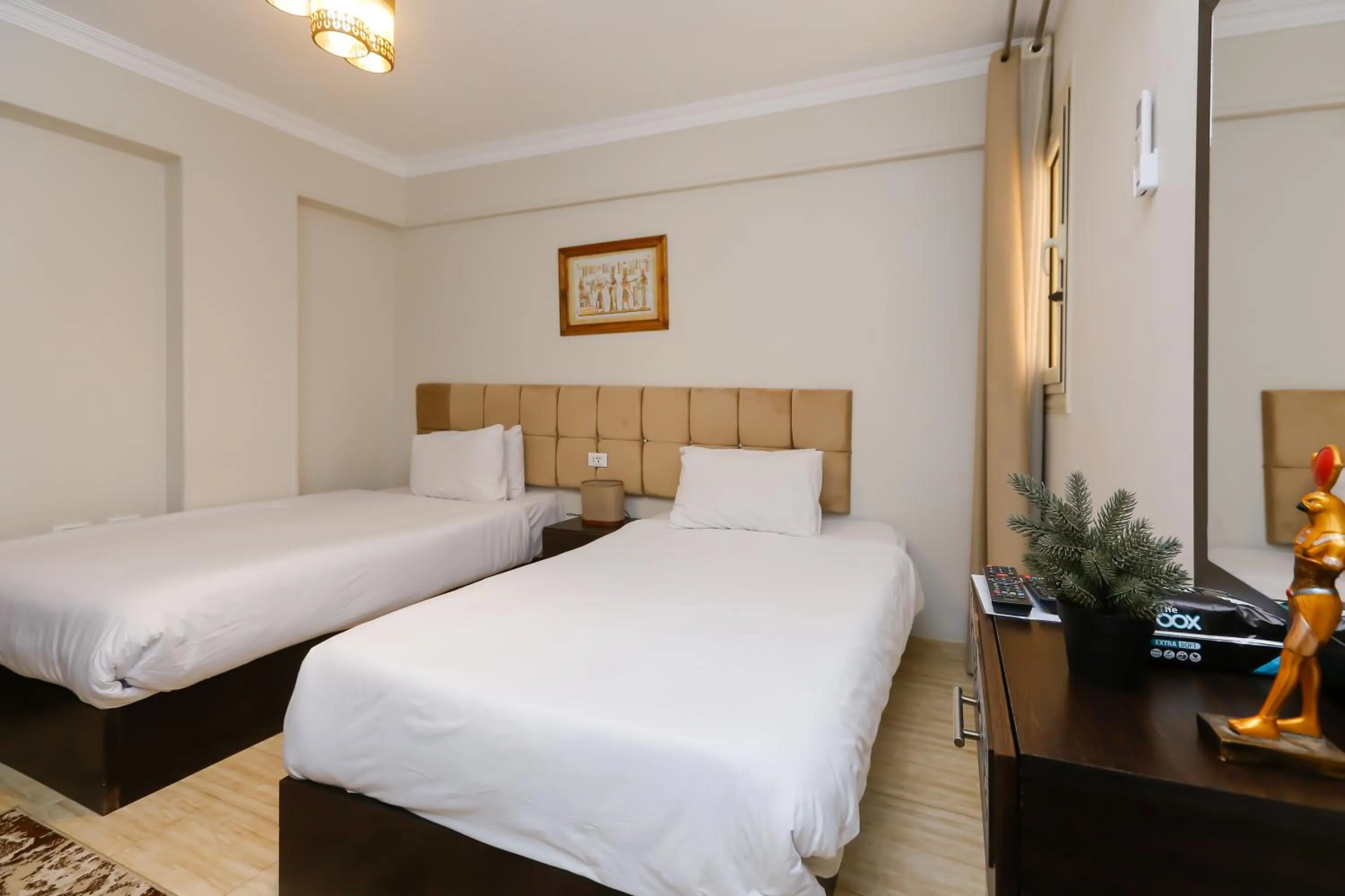 Bed in Crowne Pyramids View inn