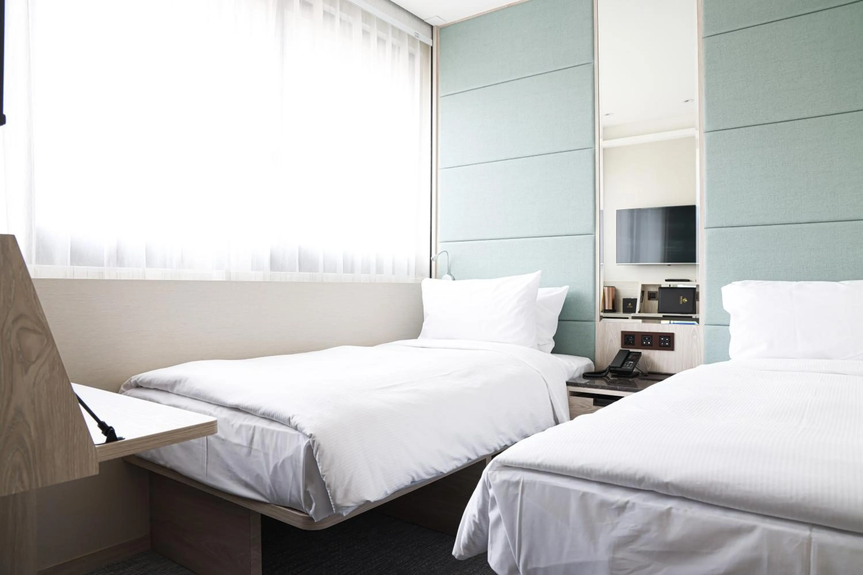 Bed in Royal Jade Boutique Hotel