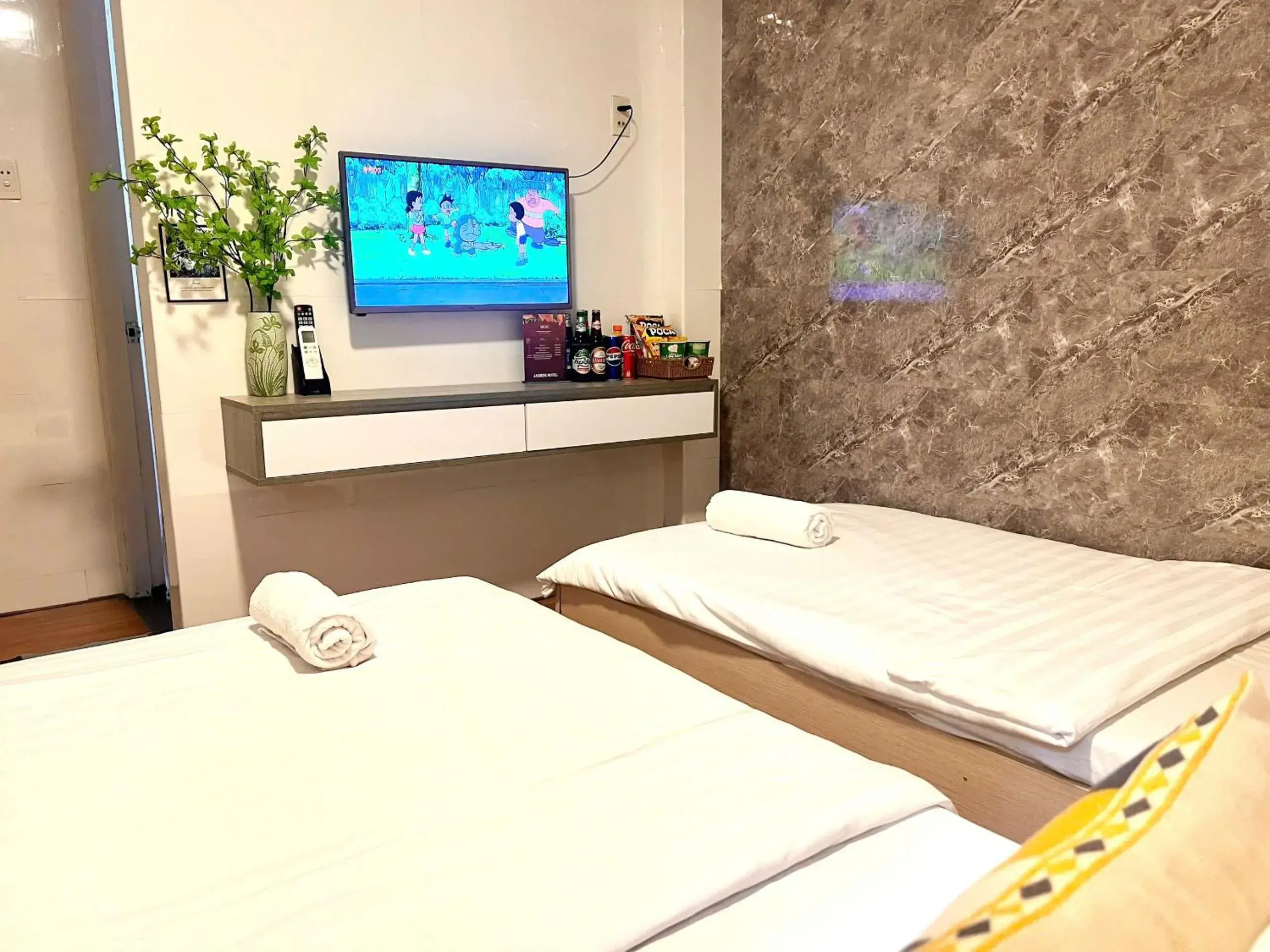 Bed in Jasmine Hotel Bed in Jasmine Hotel