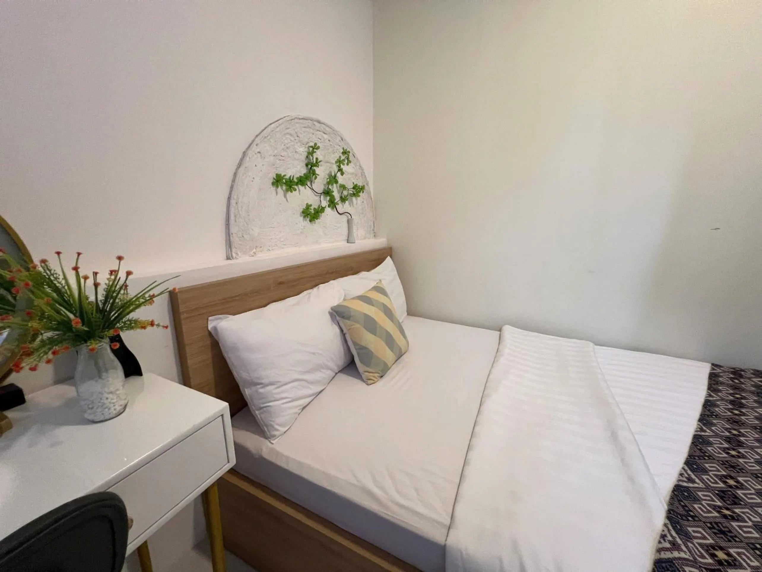 Bed in Jasmine Hotel