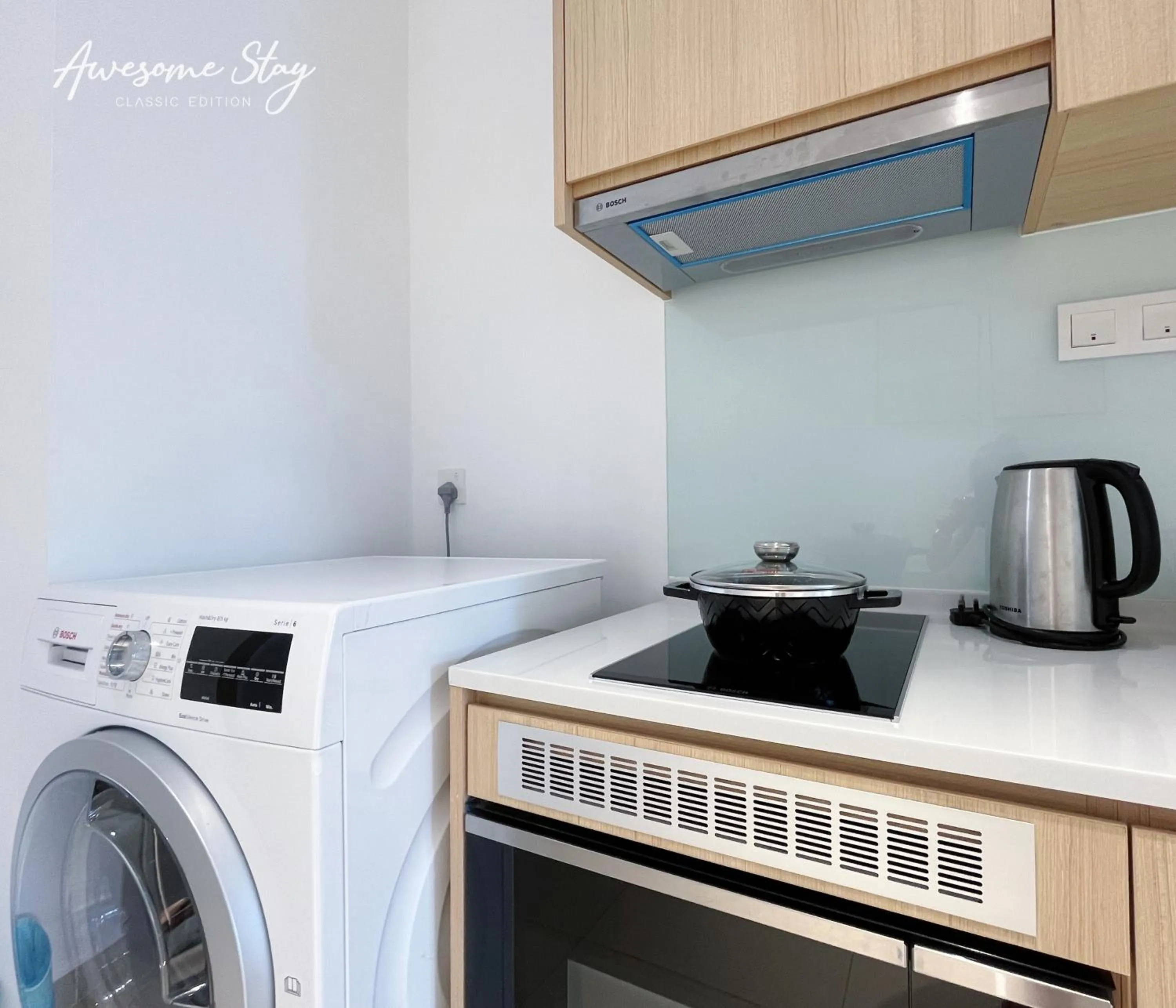 washing machine in The Colony By Infinitum By Awesomestay