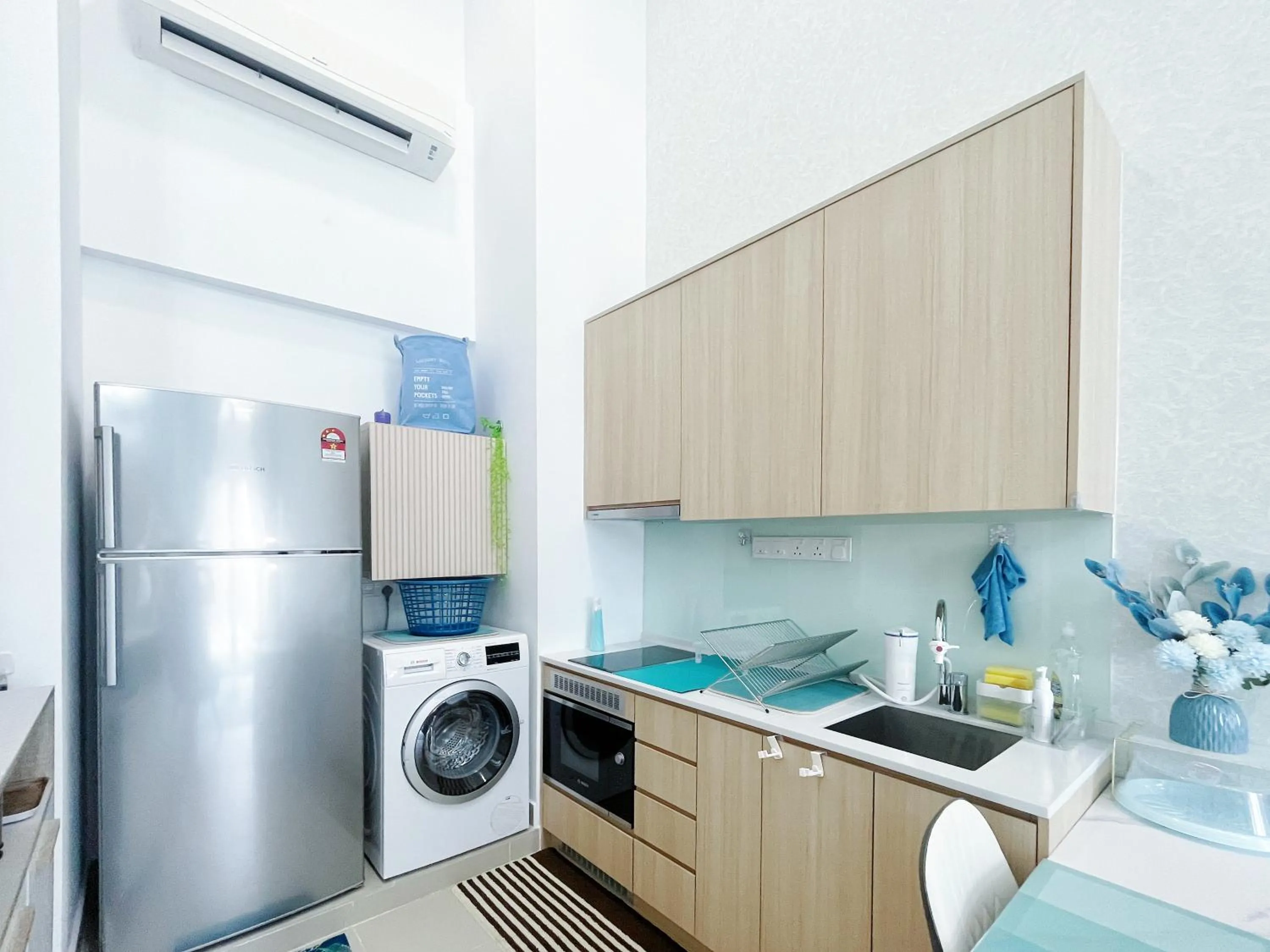 Kitchen or kitchenette in The Colony By Infinitum By Awesomestay