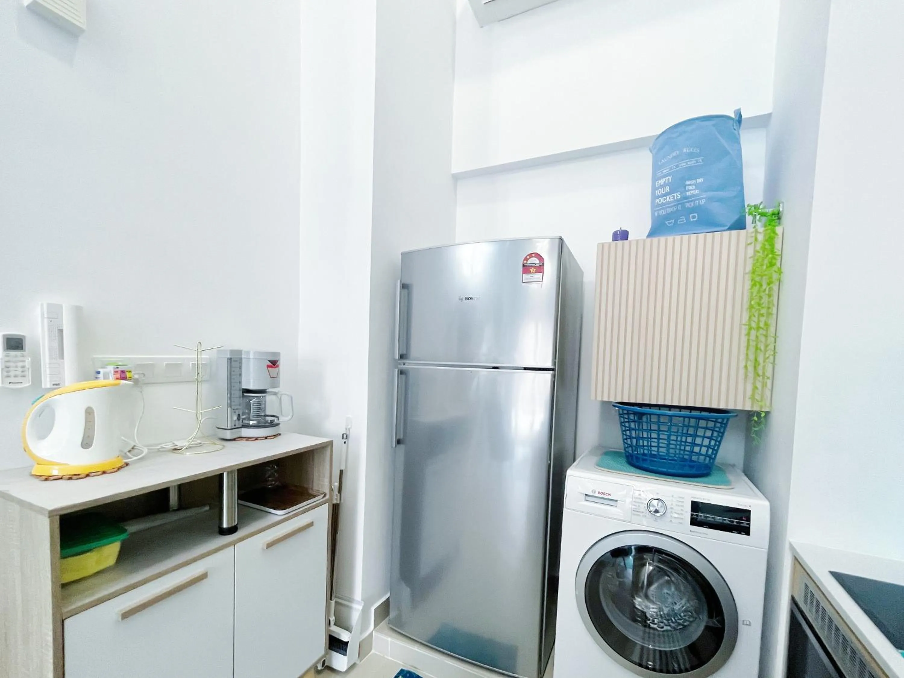 Kitchen or kitchenette in The Colony By Infinitum By Awesomestay