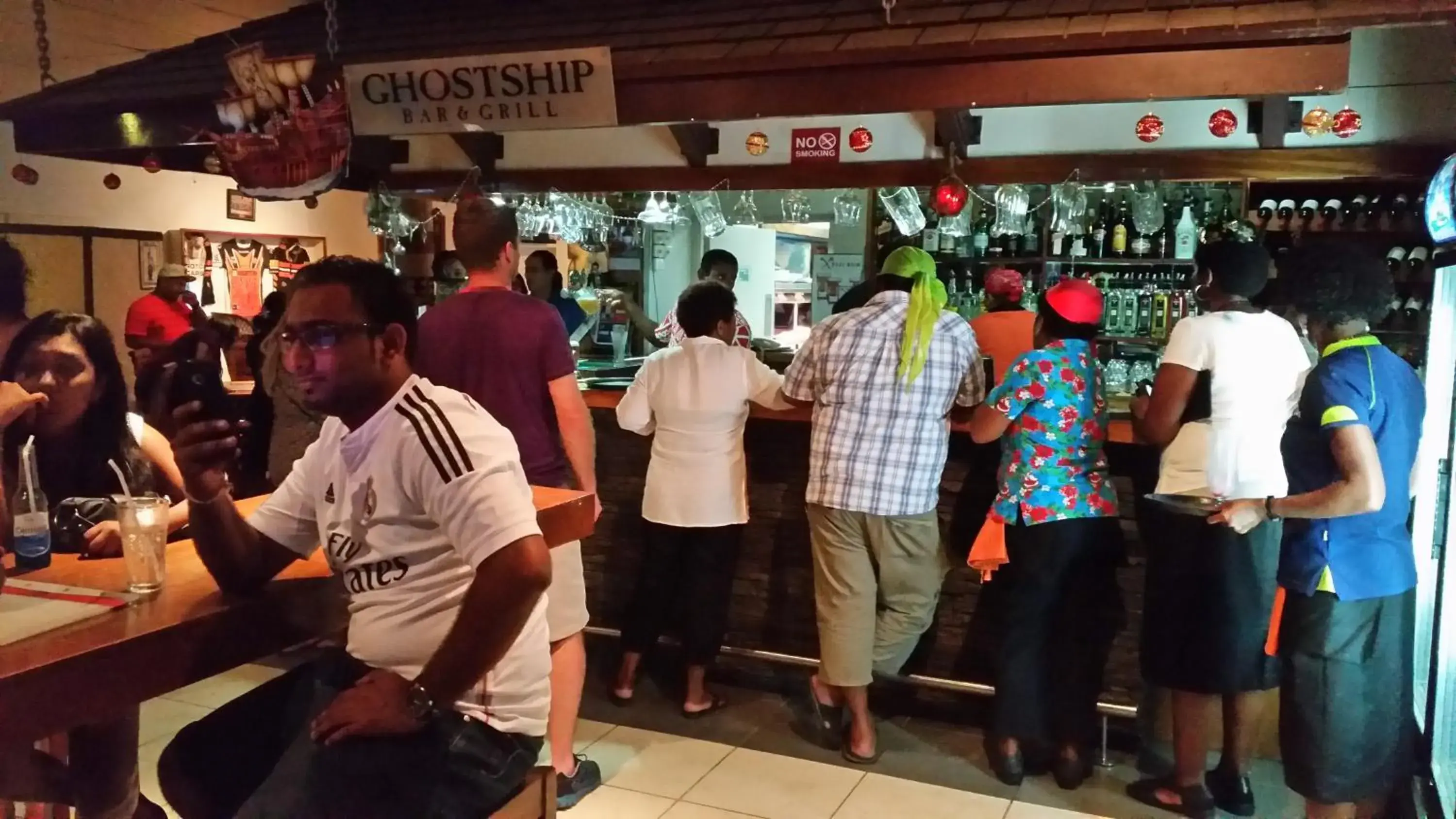 Lounge or bar in Smugglers Cove Beach Resort & Hotel Lounge or bar in Smugglers Cove Beach Resort & Hotel