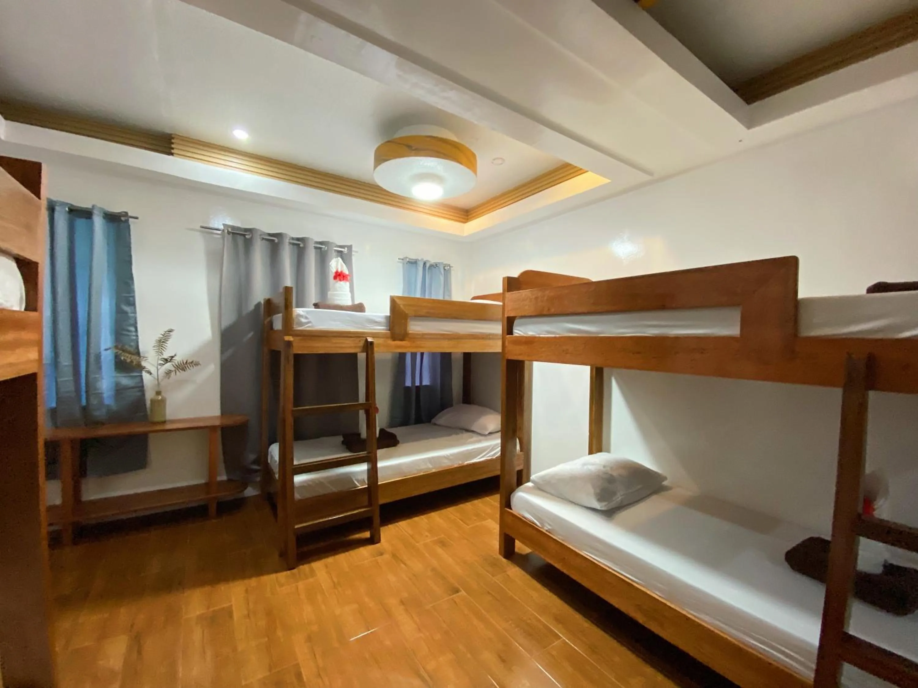 Bed in LANGOJON JIANJOY BEACH RESORT