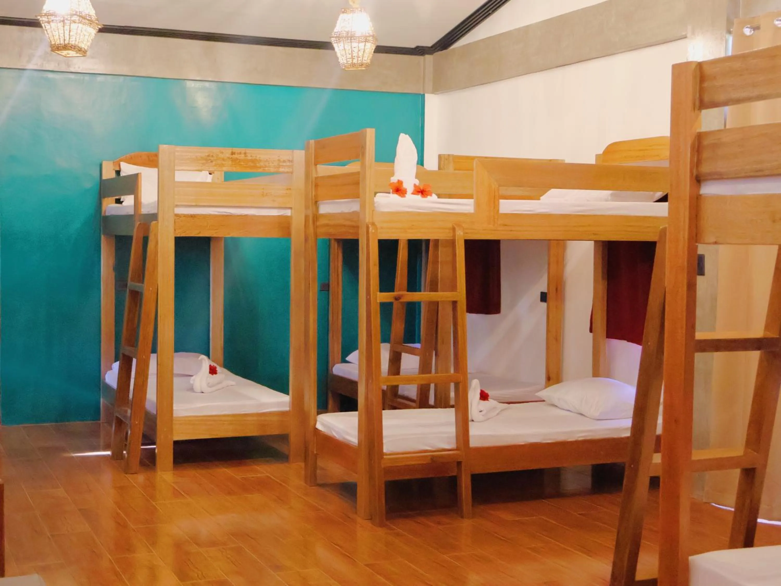 Bed in LANGOJON JIANJOY BEACH RESORT