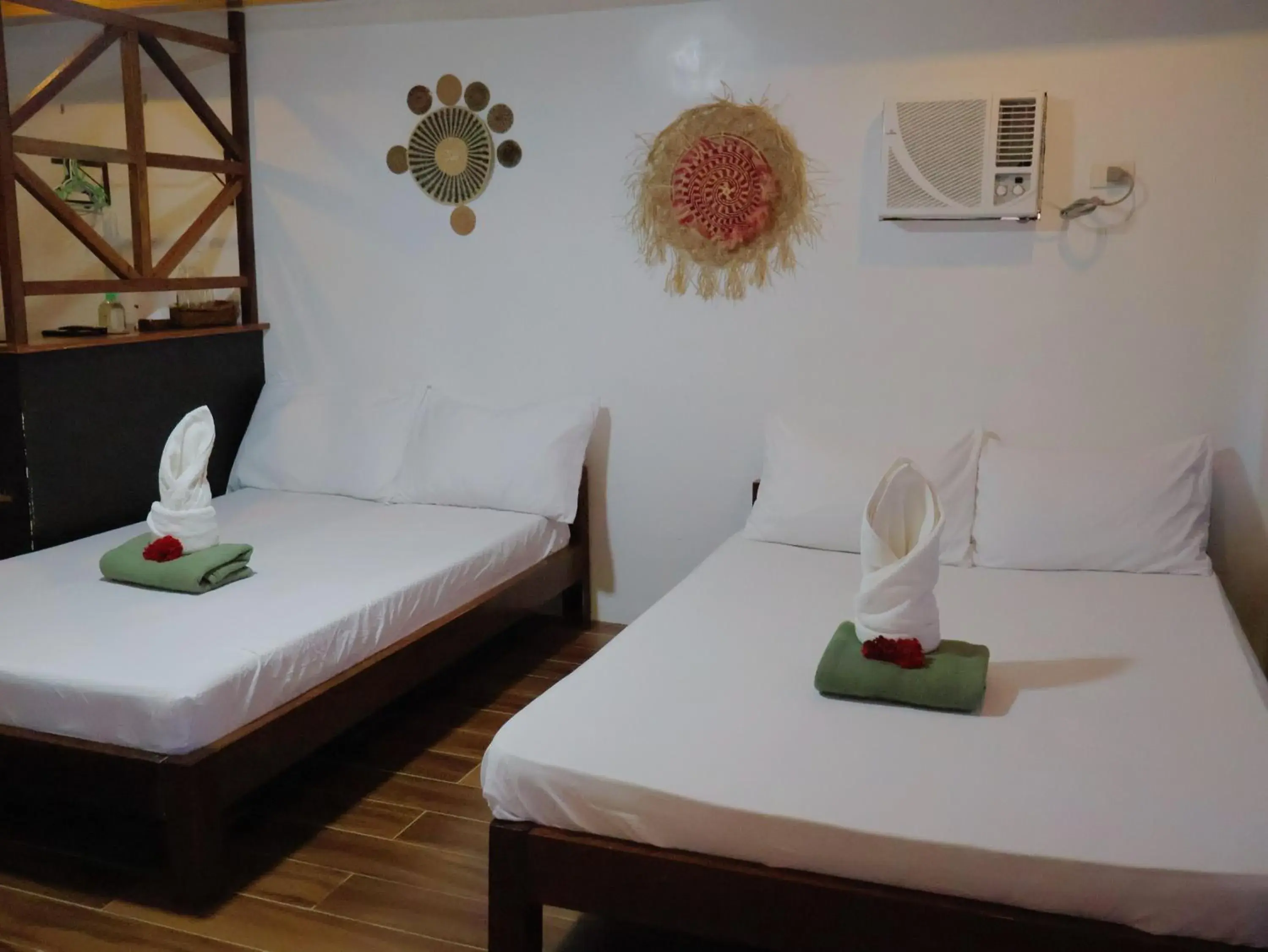 Bed in LANGOJON JIANJOY BEACH RESORT Bed in LANGOJON JIANJOY BEACH RESORT