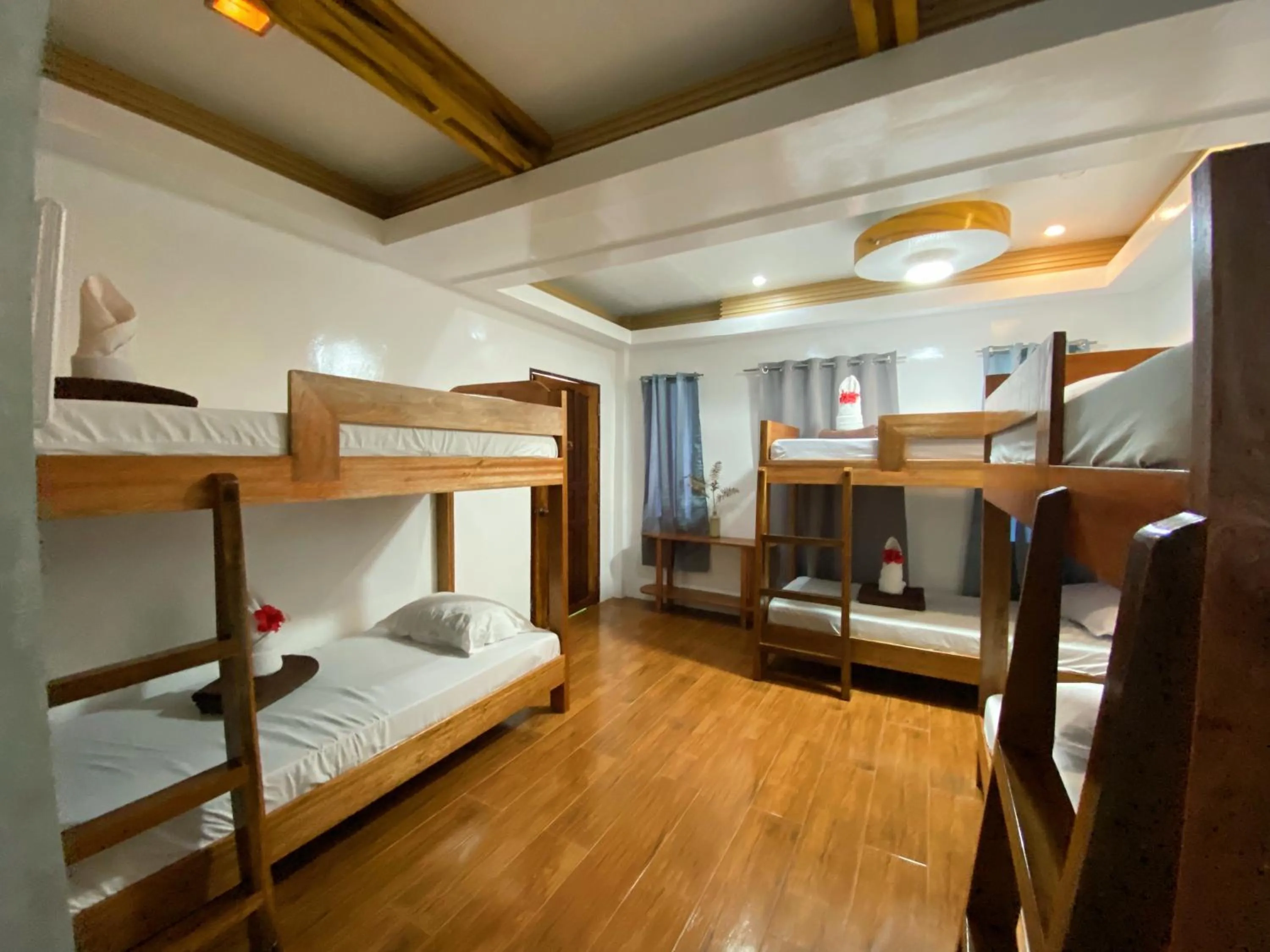 Bed in LANGOJON JIANJOY BEACH RESORT