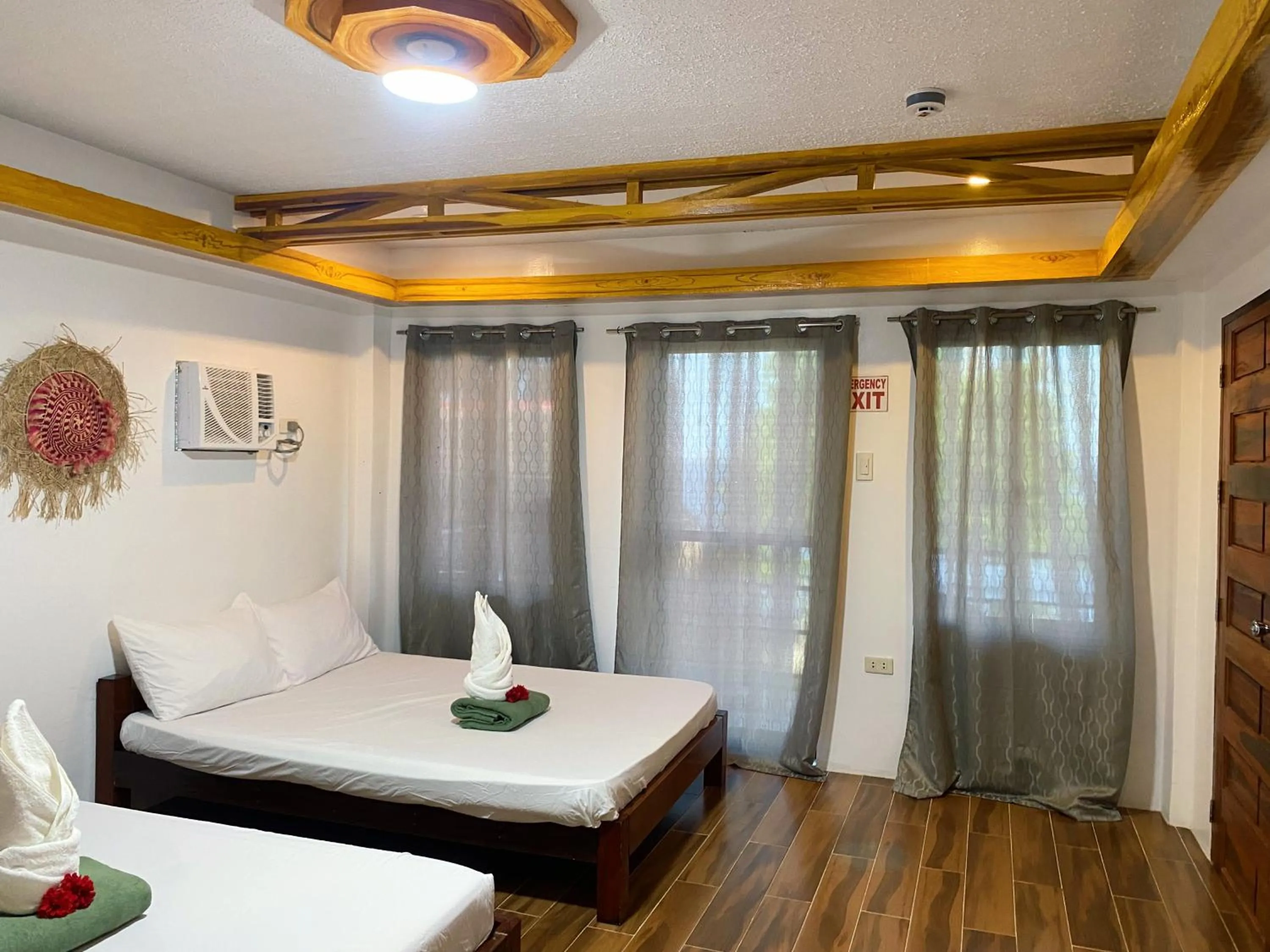 Bed in LANGOJON JIANJOY BEACH RESORT