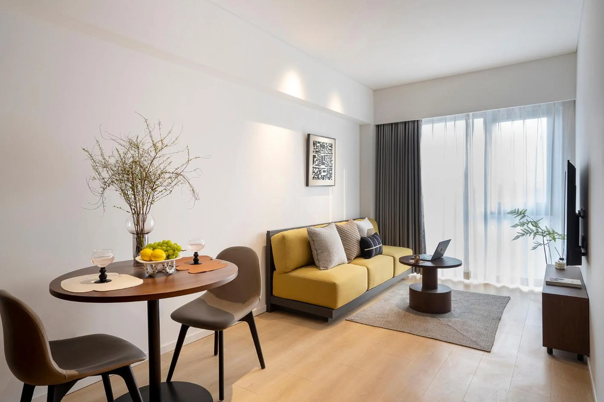 Living room in base-Beijing Wangfujing Serviced Apartment- in Hutong &Bike rental &Close to Forbidden City, Tian'anmen Square &Subway nearby &Free coffee &Washing machine,Kitchen &Restaurant discount &English speaking &High speed free WiFi