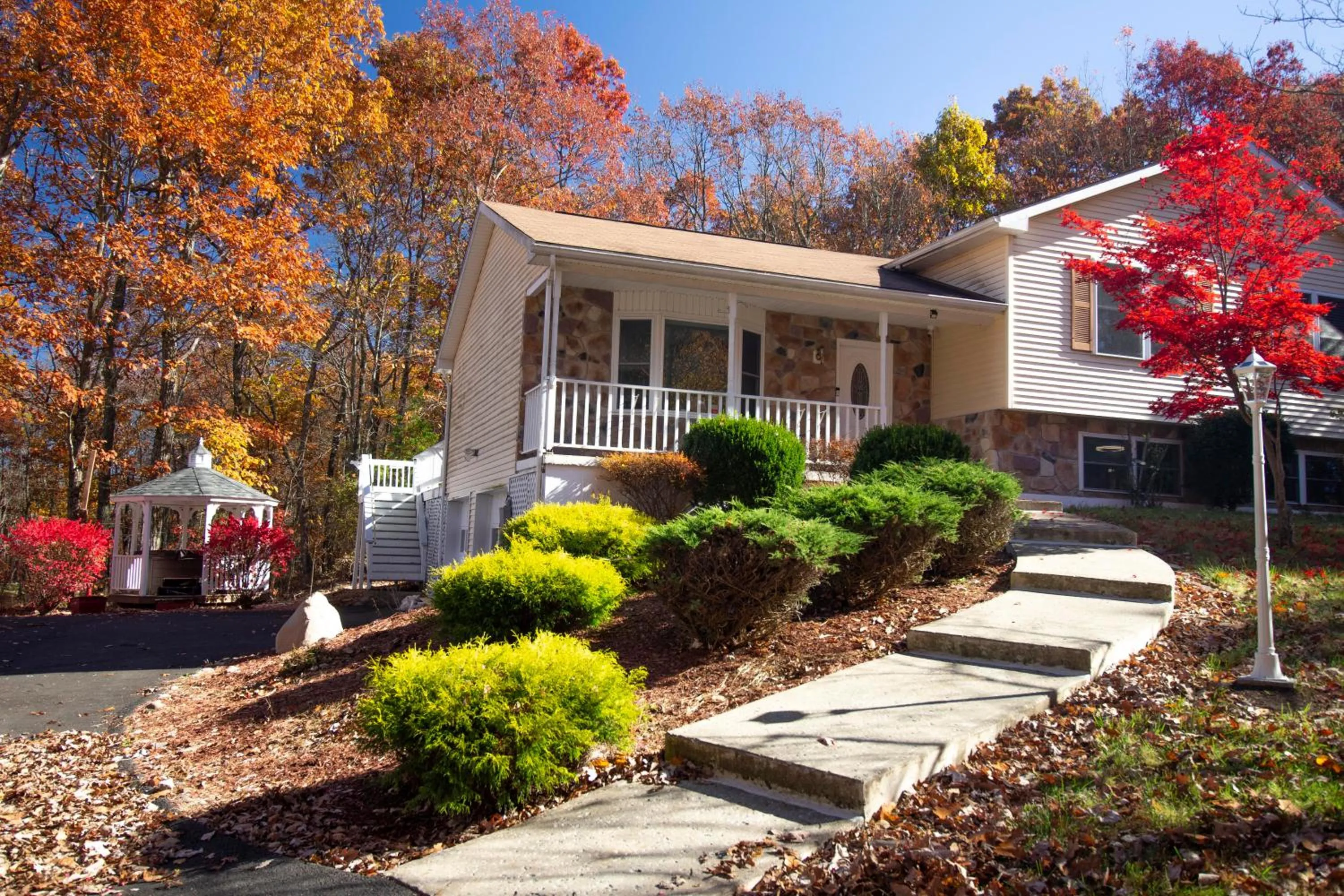 Property building in Stunning Poconos Villa- Hot Tub, Pool, Game Room, BBQ & more