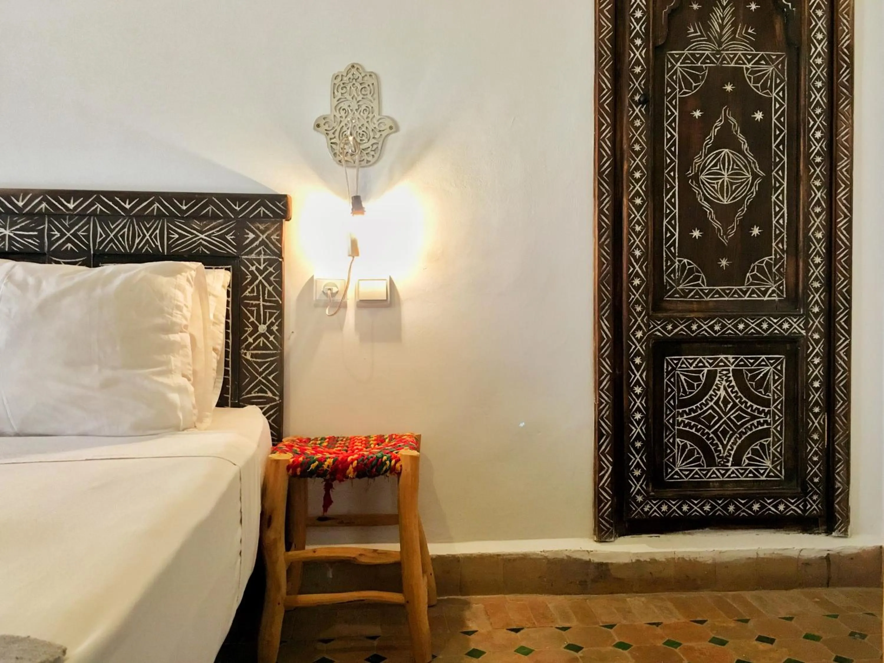 View (from property/room), Bed in Riad Inna & Watersports Center