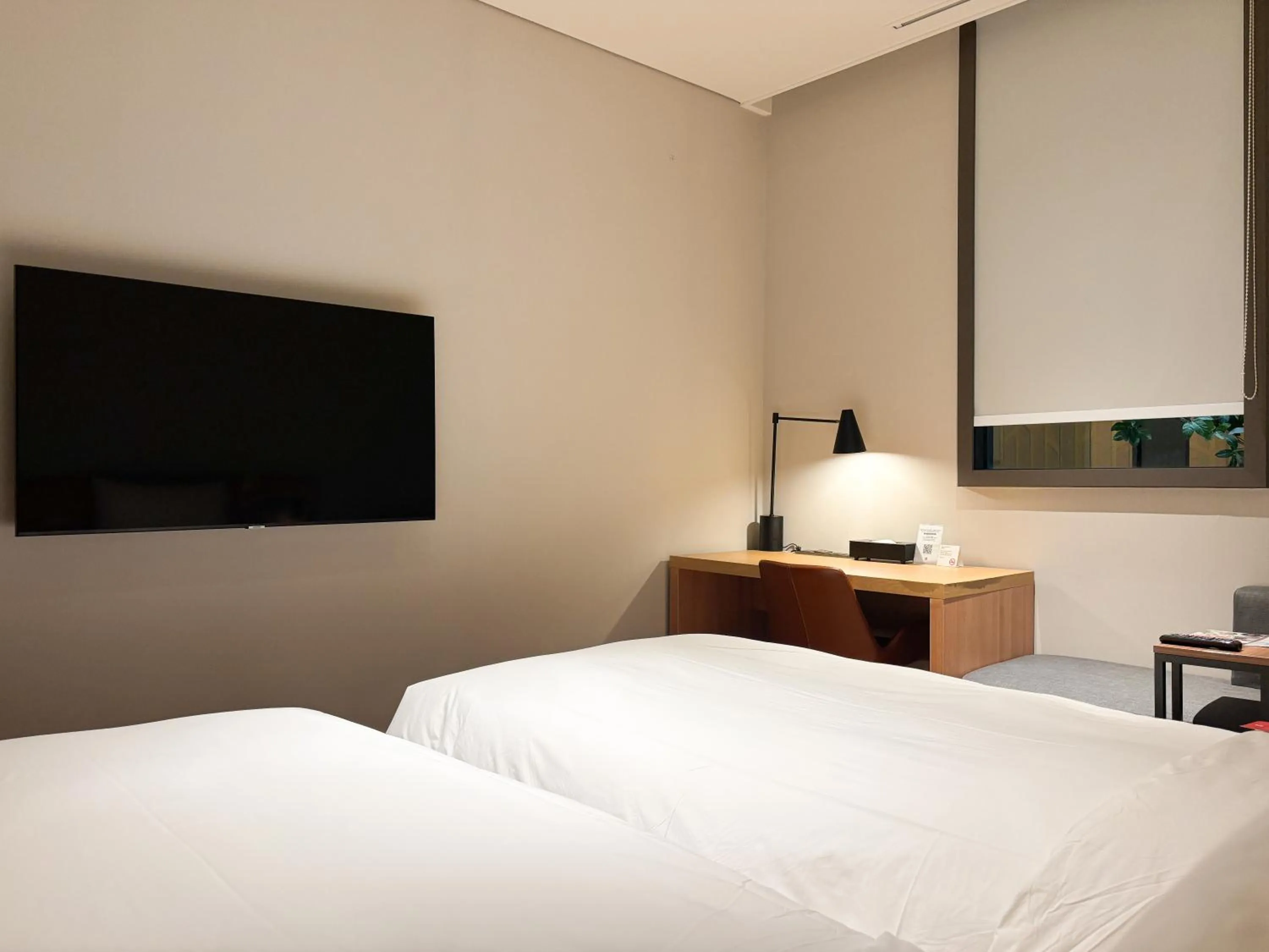 Bed in Ibis Ambassador Suwon