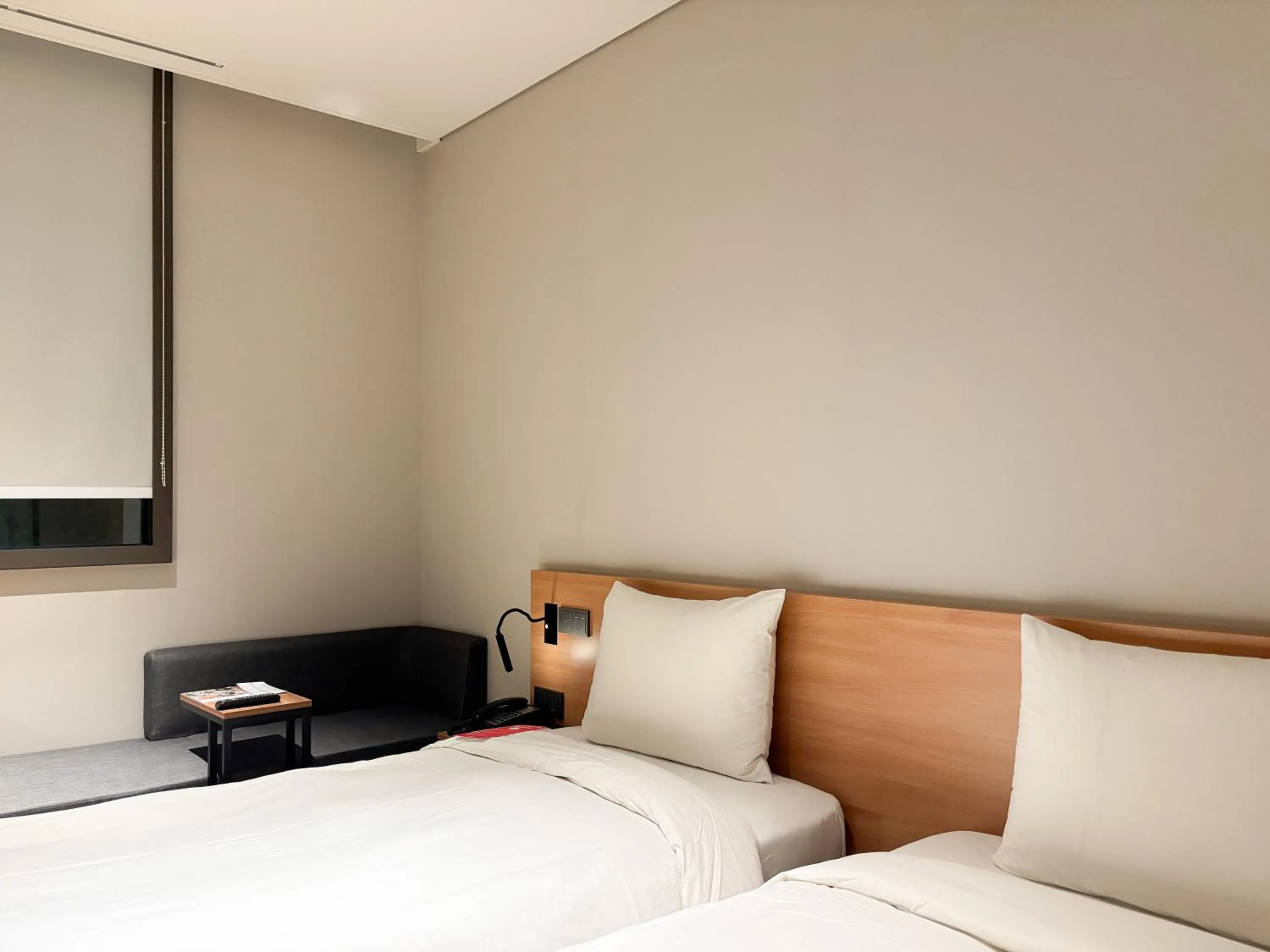 Bed in Ibis Ambassador Suwon