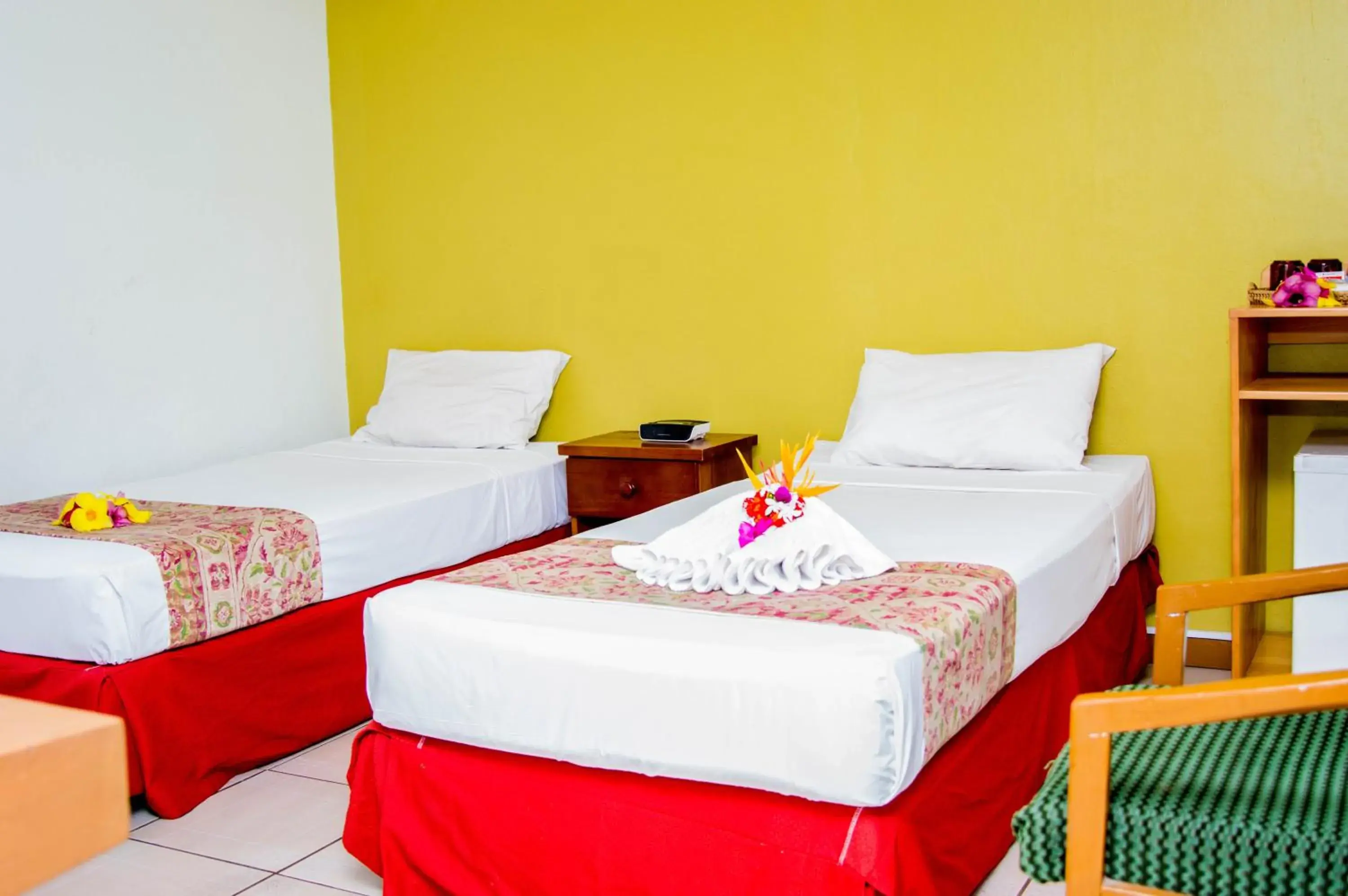 Bed in Hexagon International Hotel, Villas & Spa Bed in Hexagon International Hotel, Villas & Spa