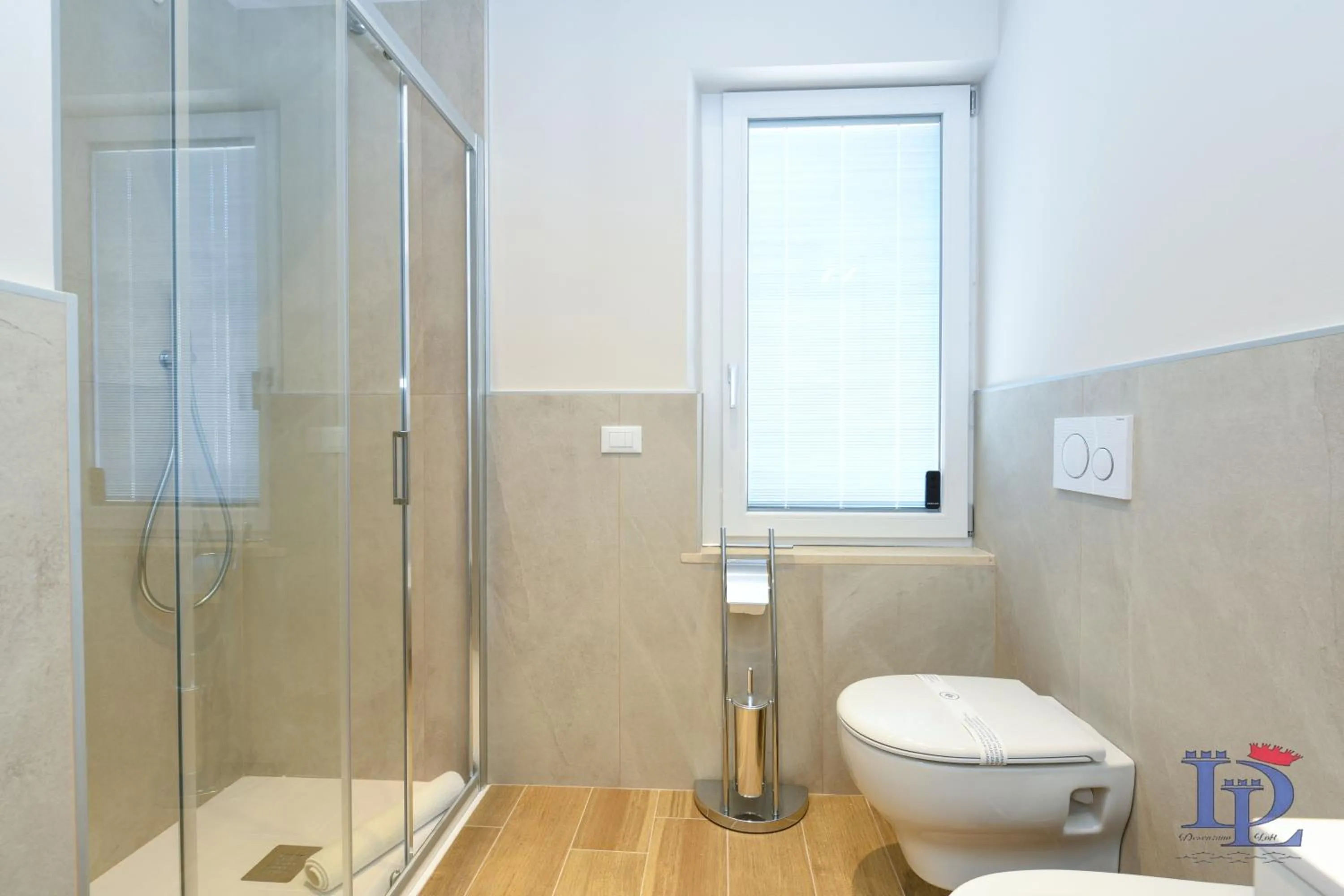 Shower in Cappuccino Apartment DesenzanoLoft Official Partner Homes & Villas by Marriott Bonvoy