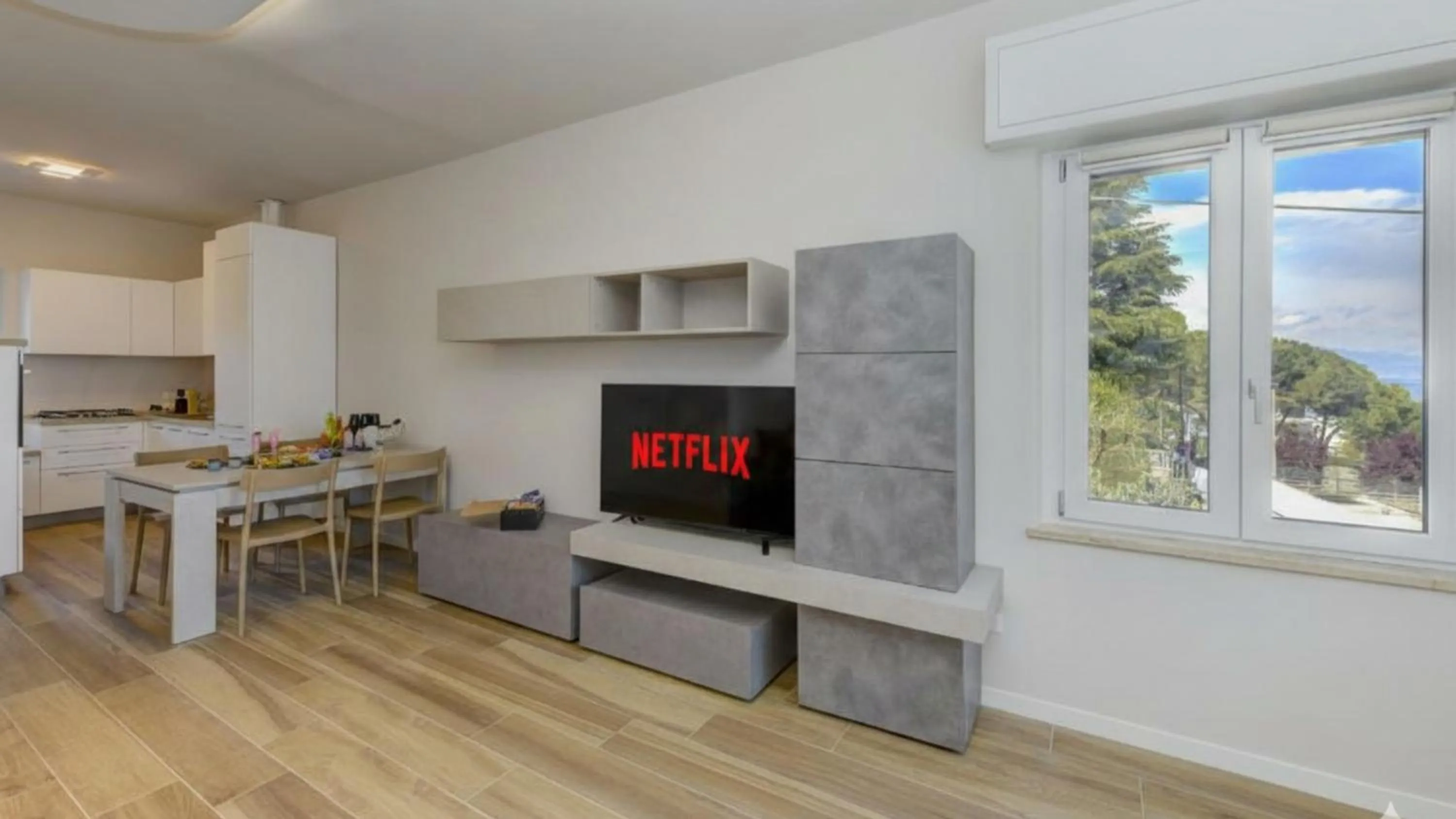 TV and multimedia in Cappuccino Apartment DesenzanoLoft Official Partner Homes & Villas by Marriott Bonvoy