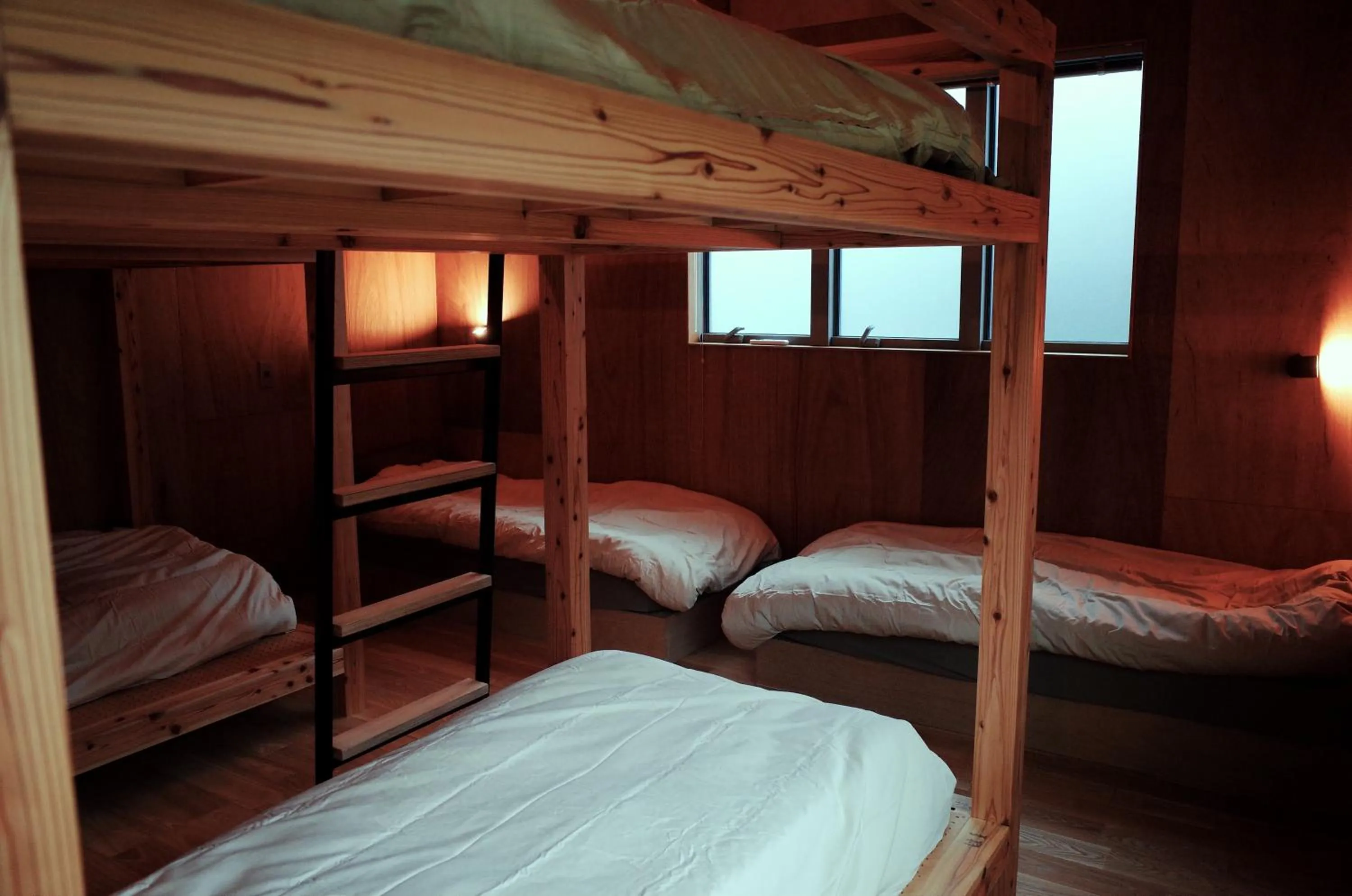 Bed in MAGATAMA.INN