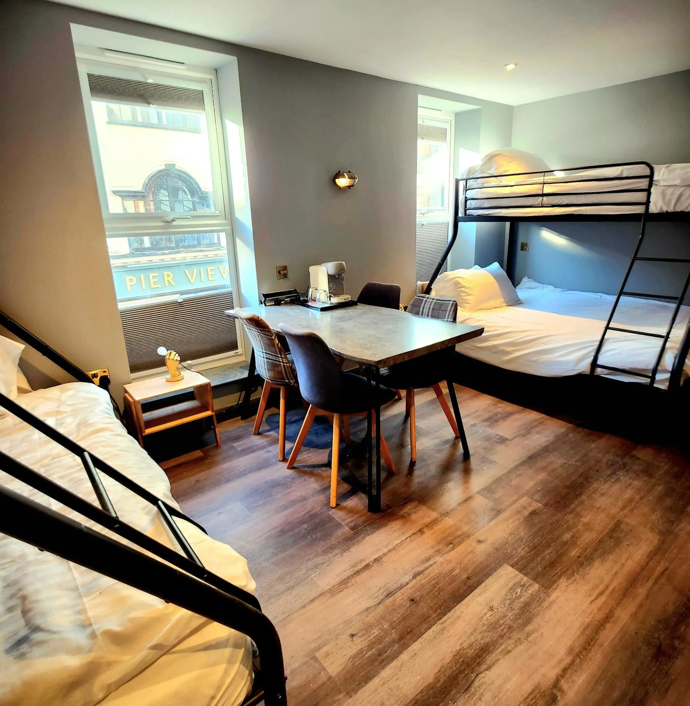 Bed in Pinnacle Suites Hotel