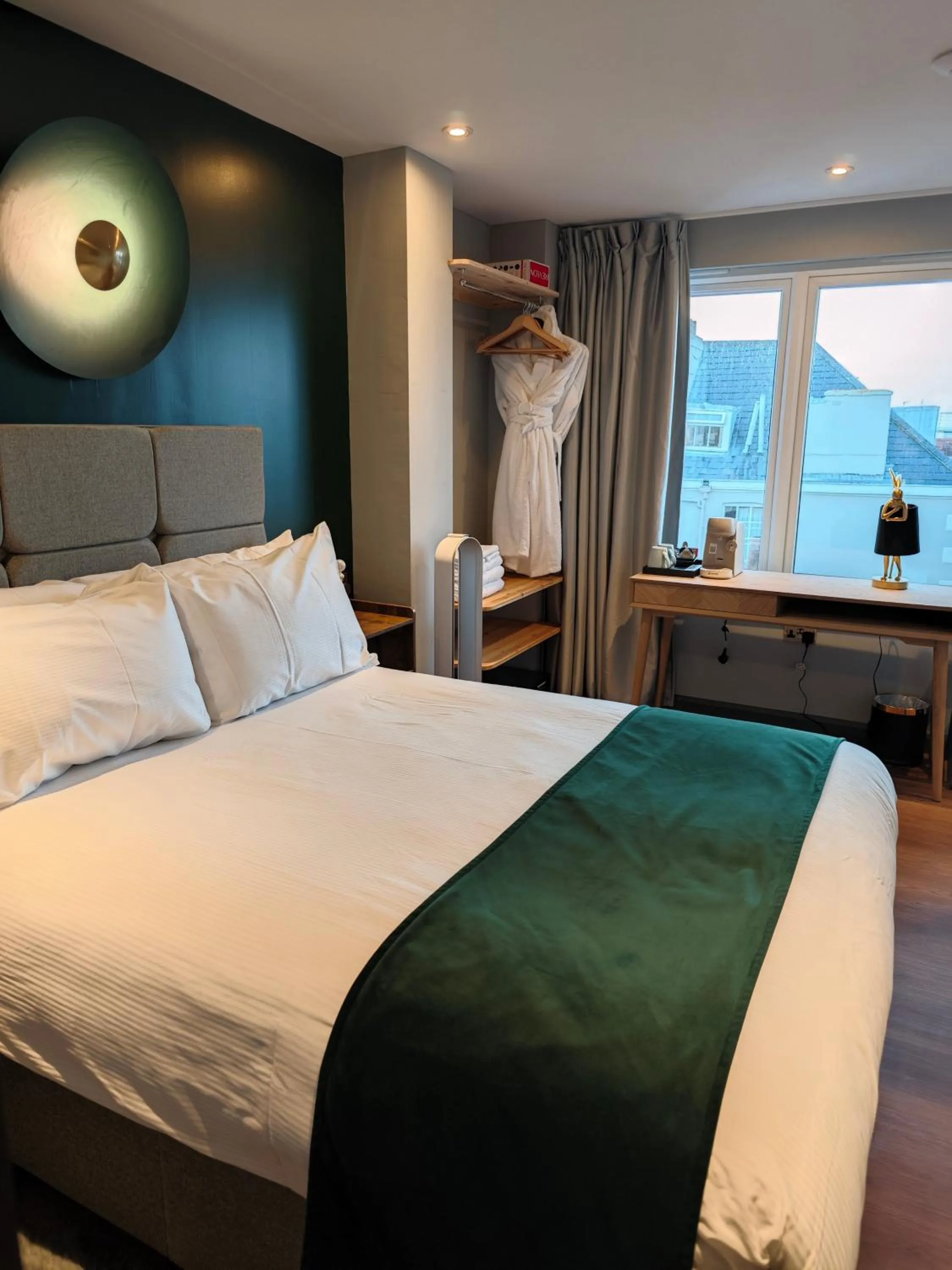 Bed in Pinnacle Suites Hotel