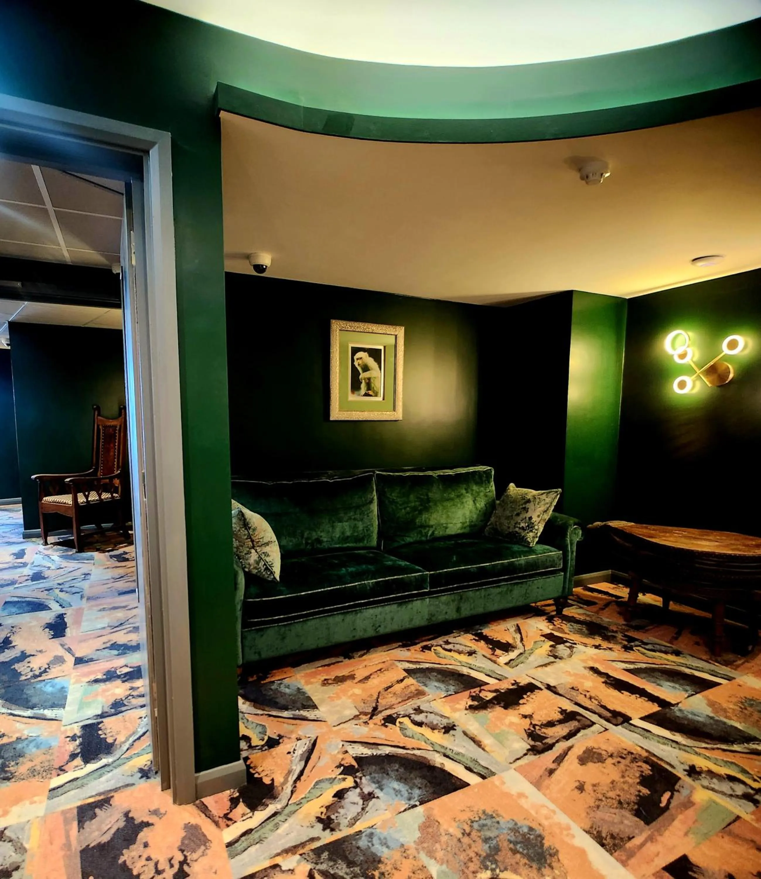 Seating area in Pinnacle Suites Hotel