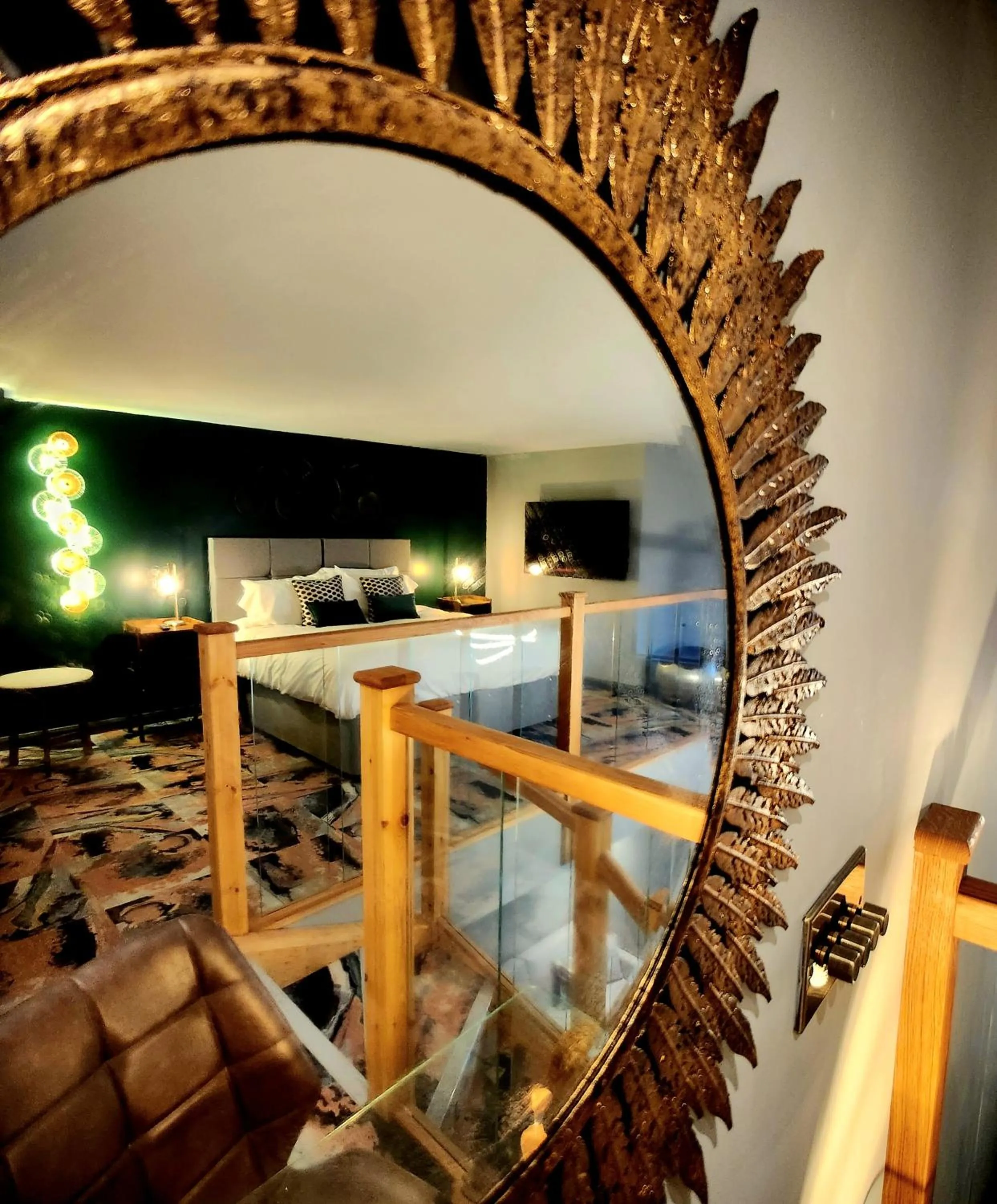 Bed in Pinnacle Suites Hotel