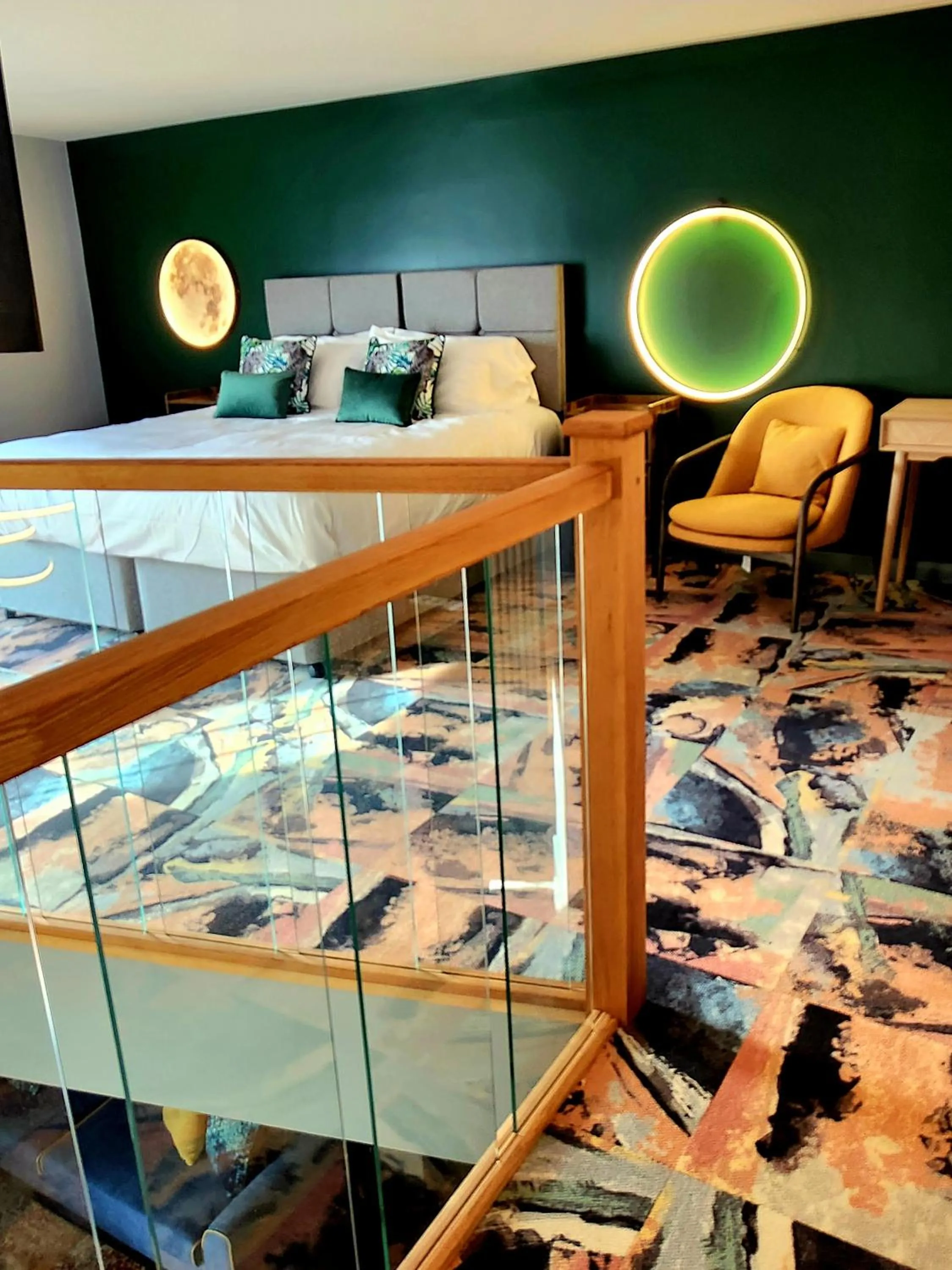 Bed in Pinnacle Suites Hotel