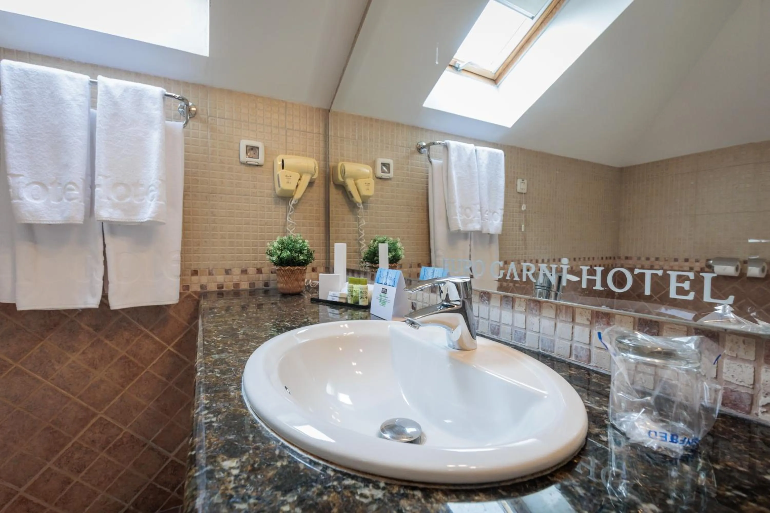 Bathroom in Euro Garni Hotel