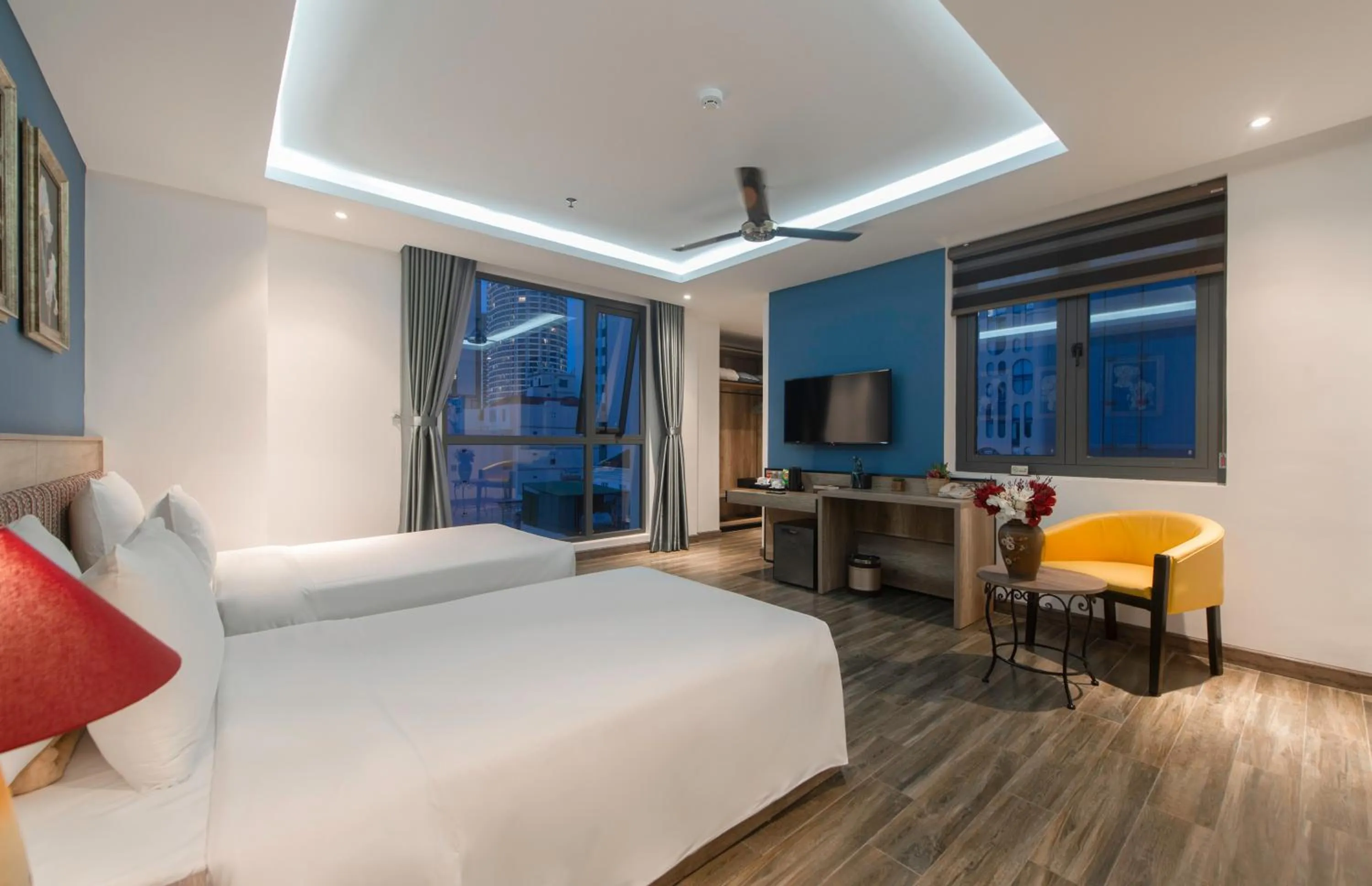 Communal lounge/ TV room, Bed in Aaron Boutique Hotel