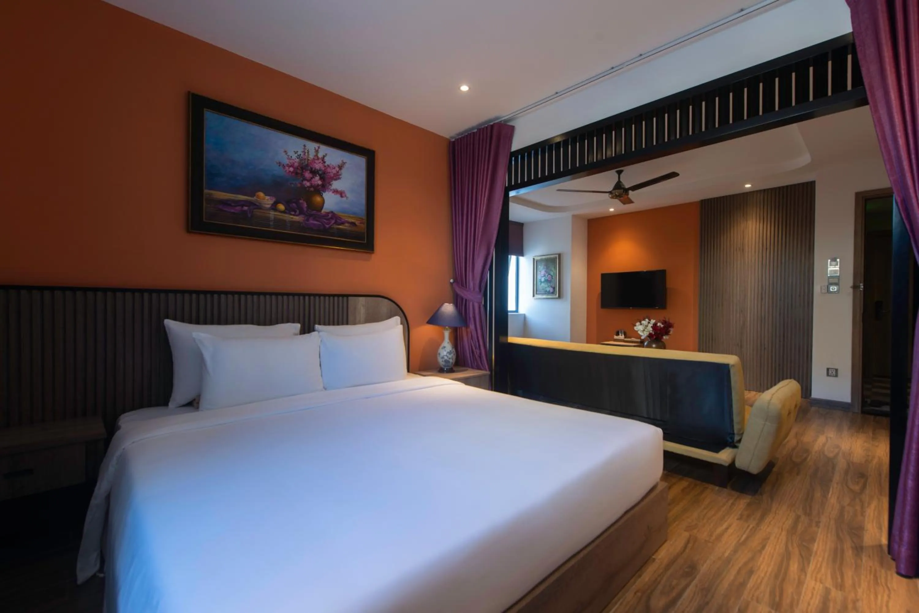 Communal lounge/ TV room, Bed in Aaron Boutique Hotel