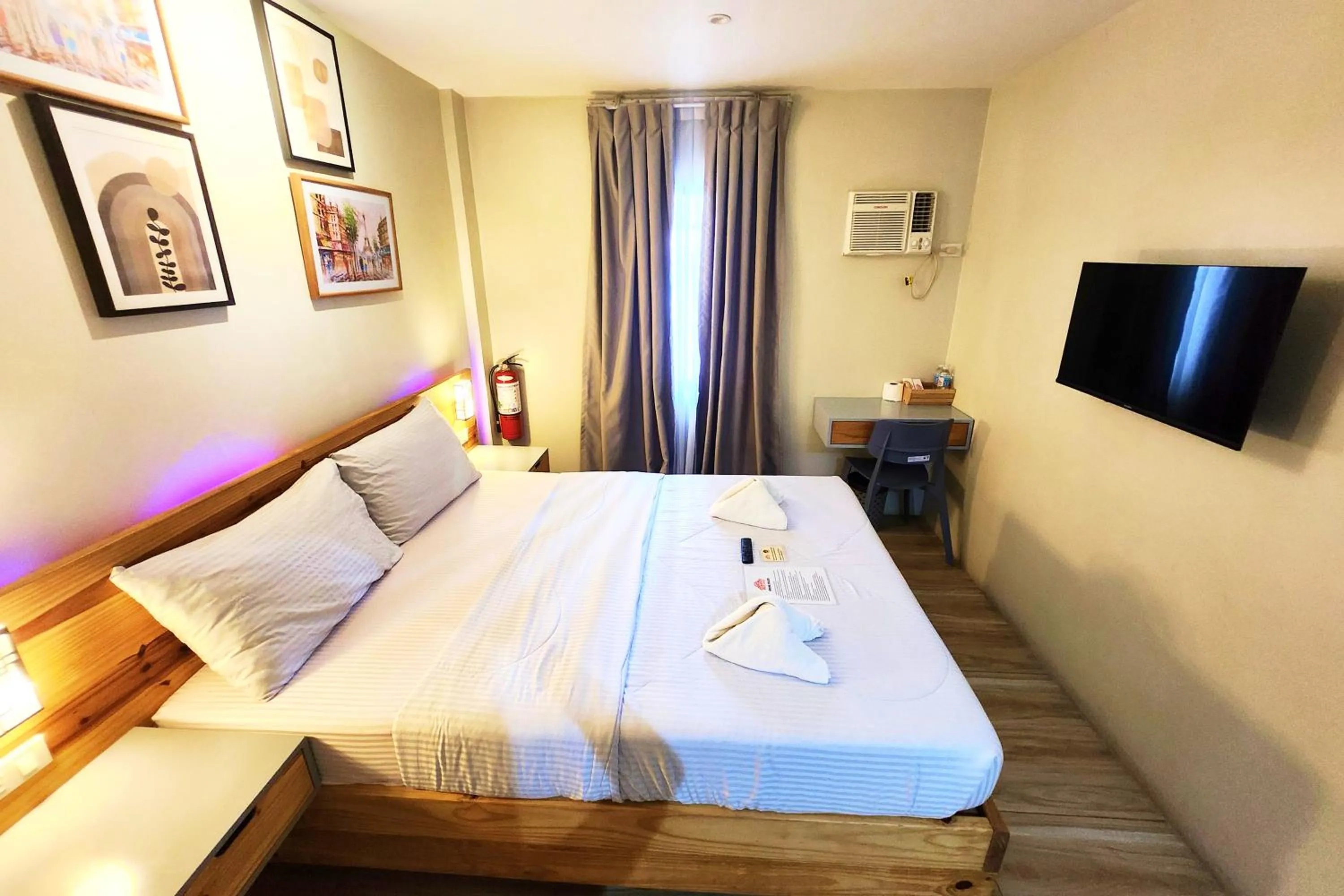 Bed in DLT Suites Cebu powered by Cocotel