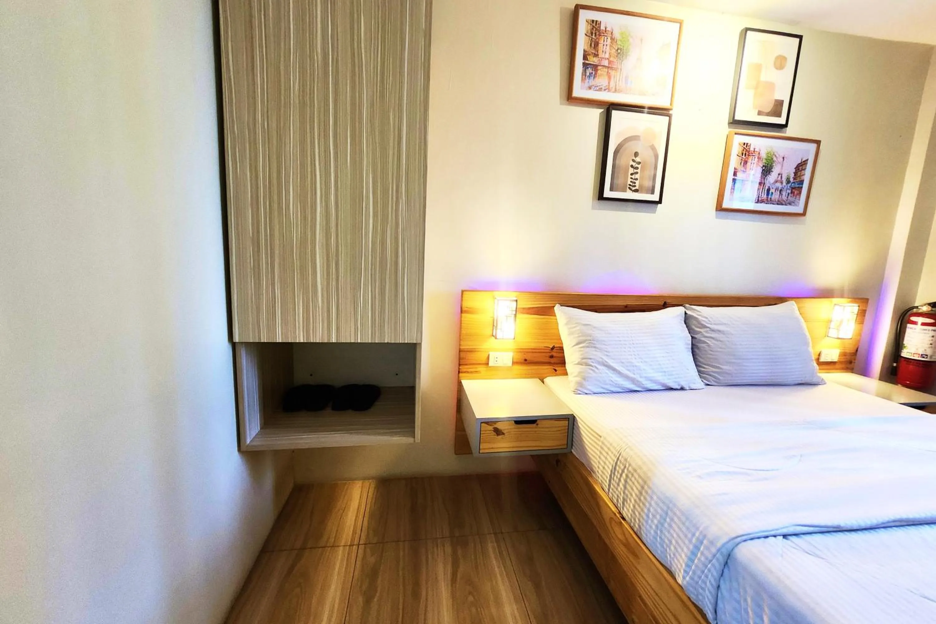 Bed in DLT Suites Cebu powered by Cocotel