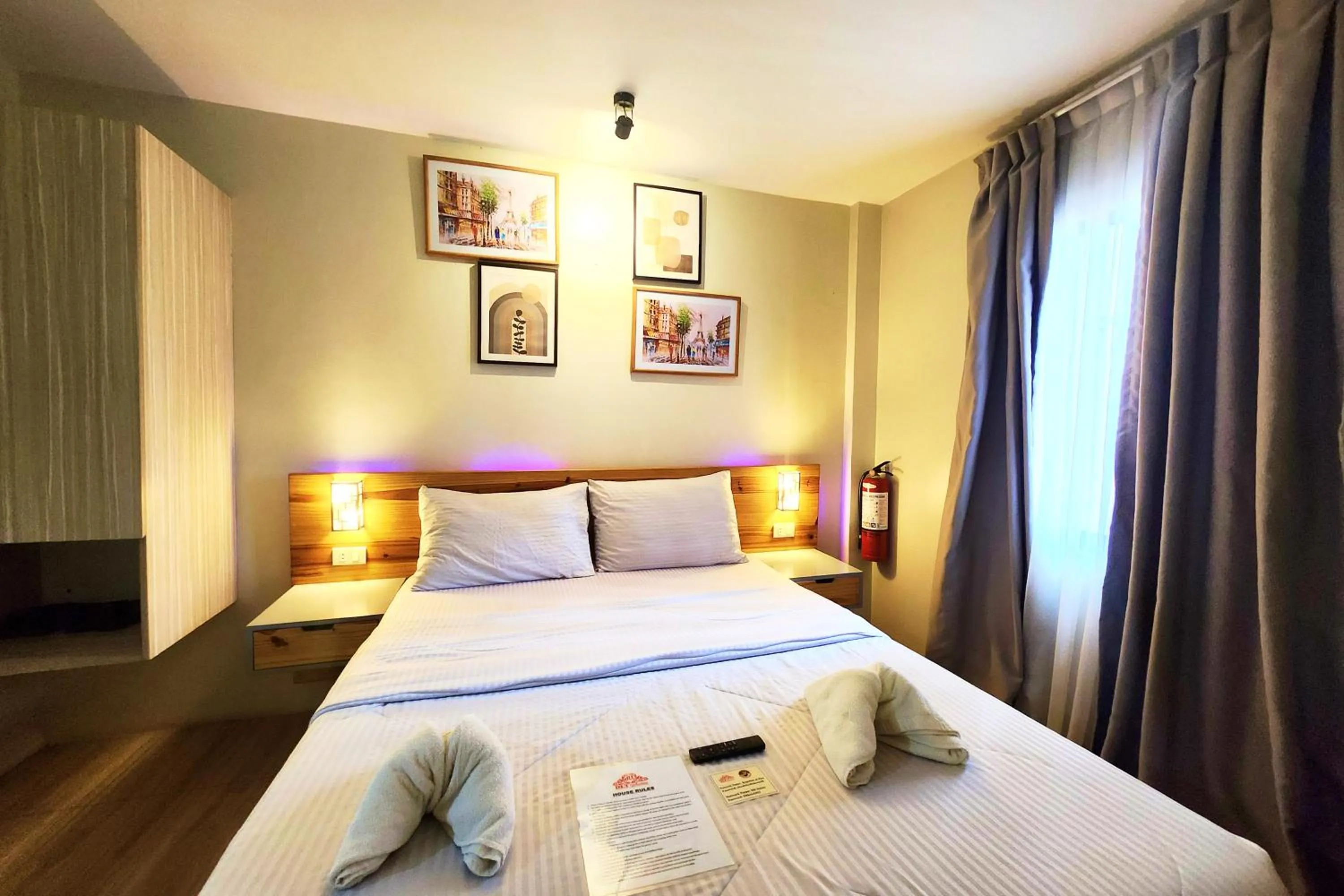 Bed in DLT Suites Cebu powered by Cocotel