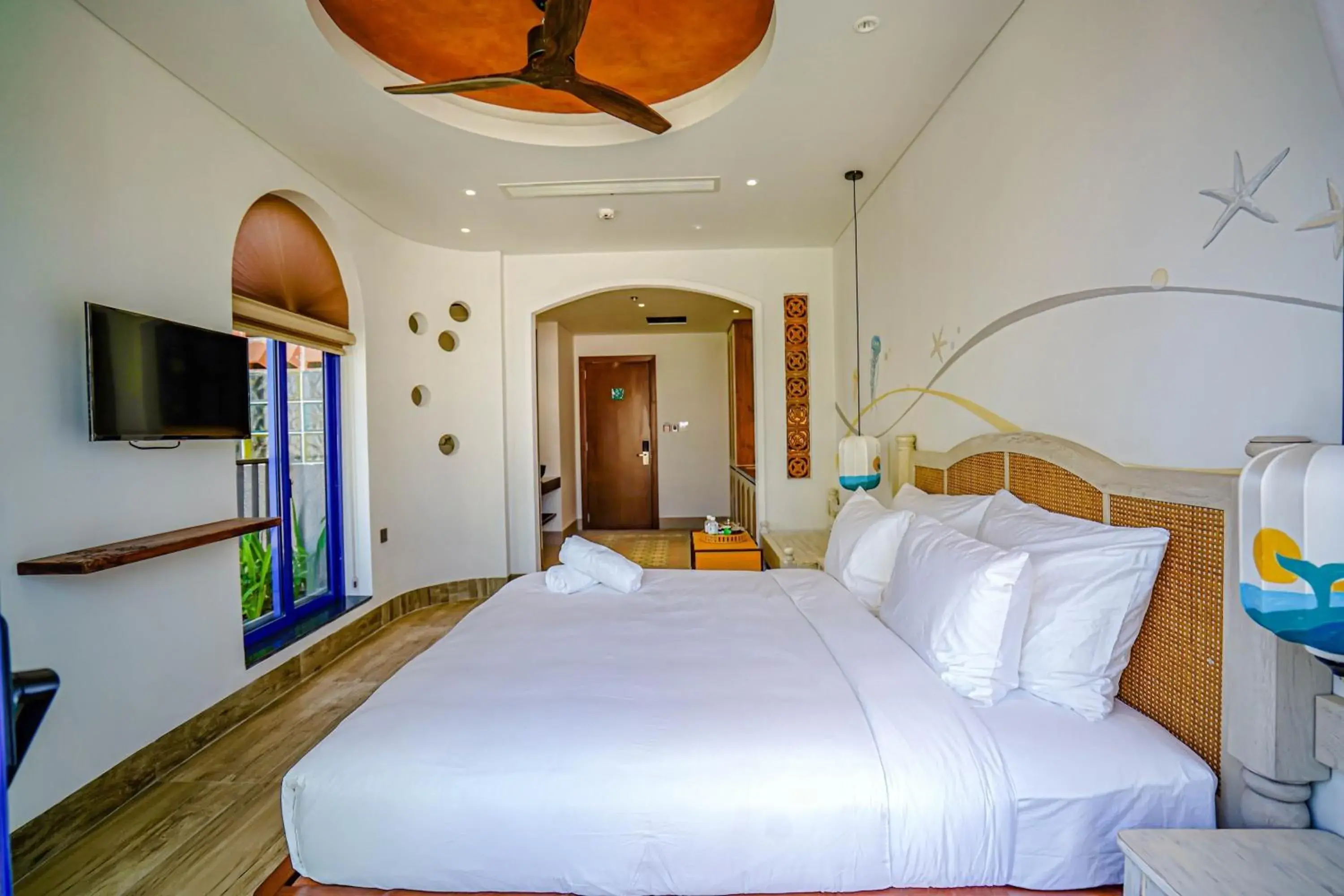 Communal lounge/ TV room, Bed in Seahorse Signature Danang Hotel by Haviland Communal lounge/ TV room, Bed in Seahorse Signature Danang Hotel by Haviland