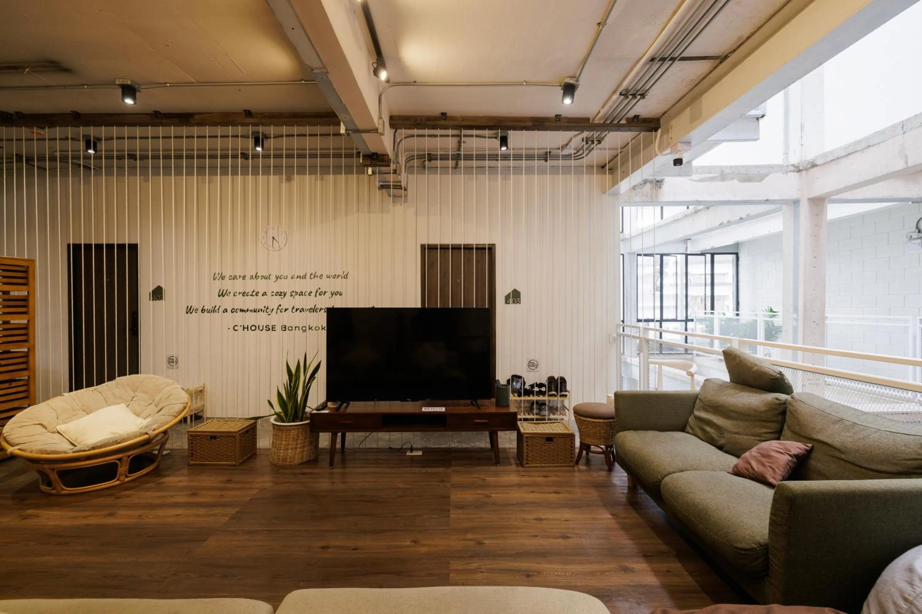 Communal lounge/ TV room in C'HOUSE Bangkok