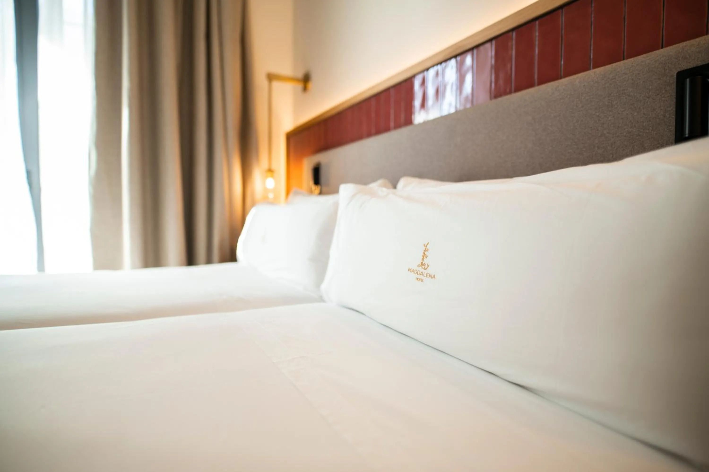 Bed in Legado Magdalena Hotel