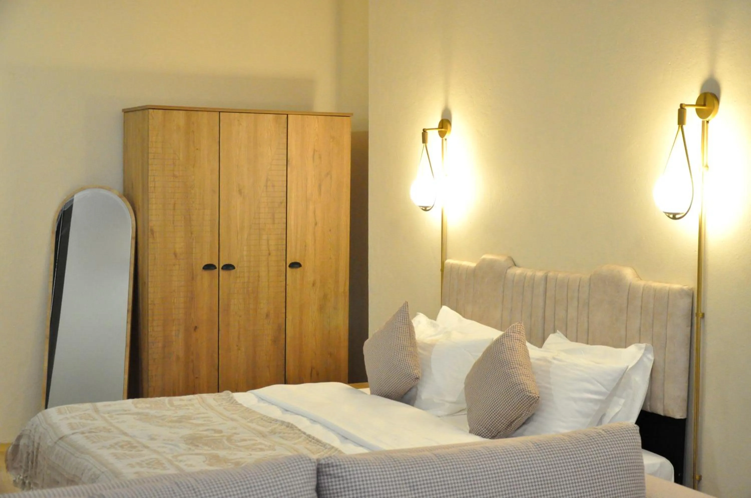 Bed in Golden Door Hotel