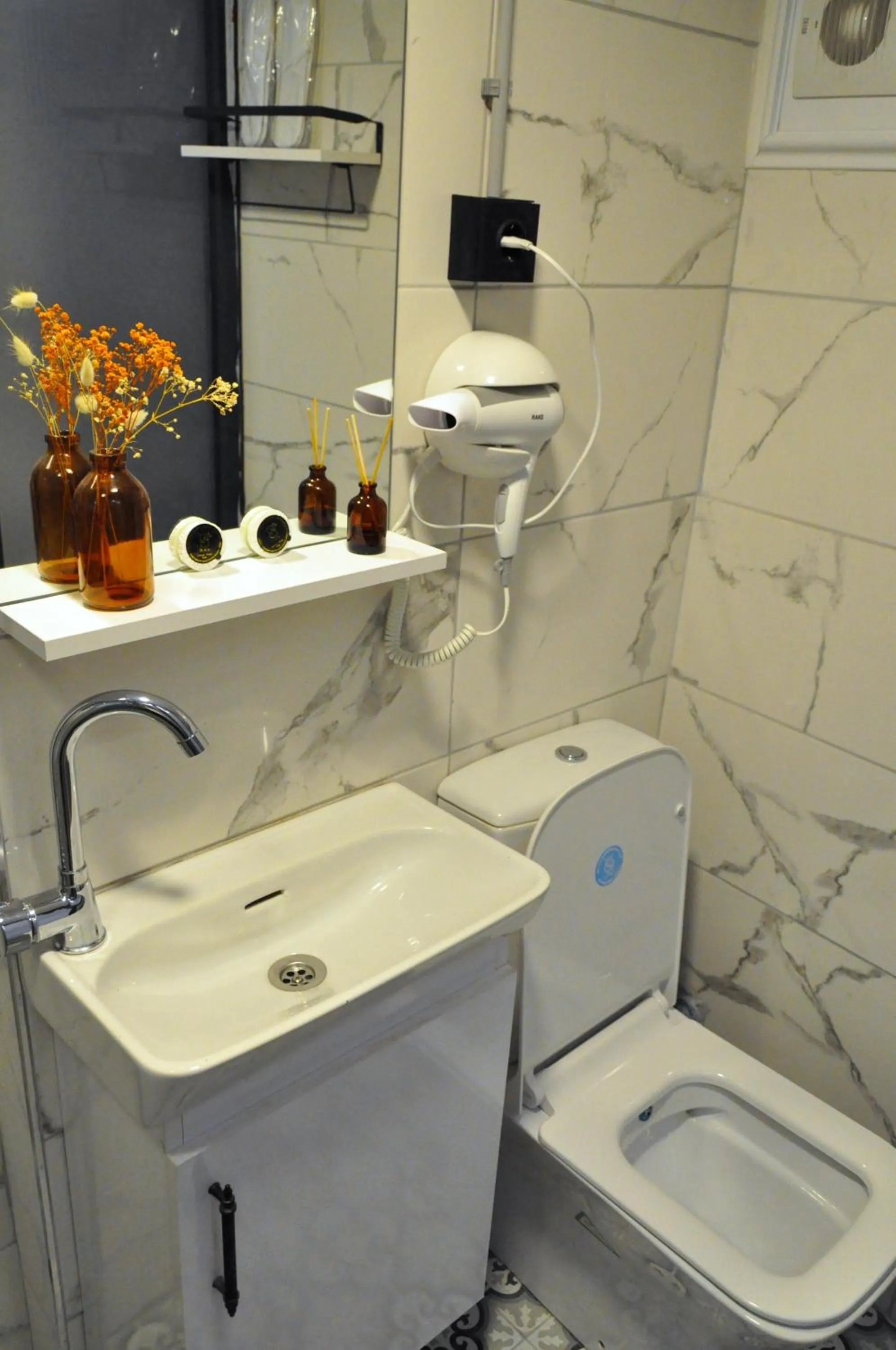 Toilet in Golden Door Hotel