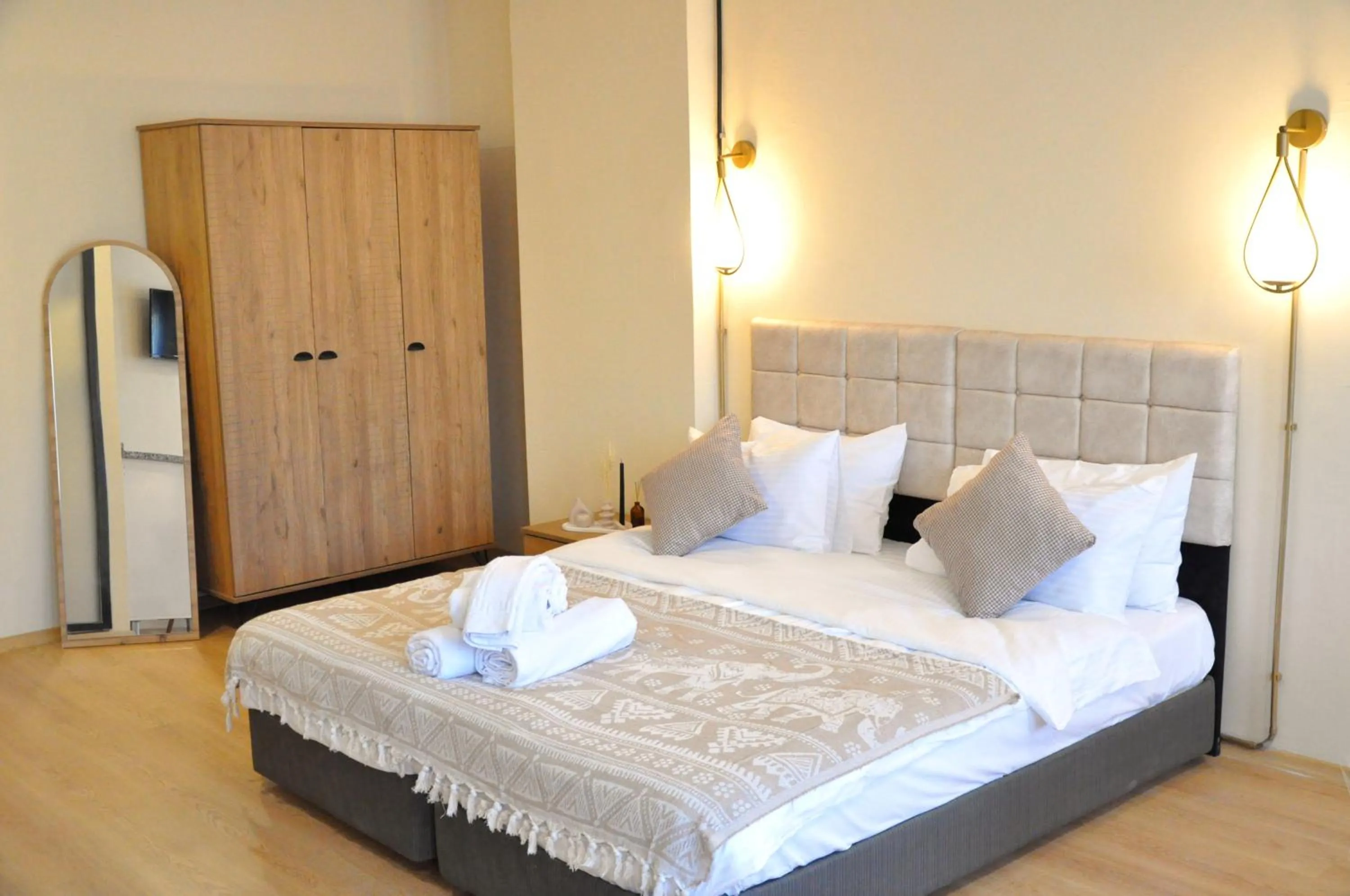 Bed in Golden Door Hotel