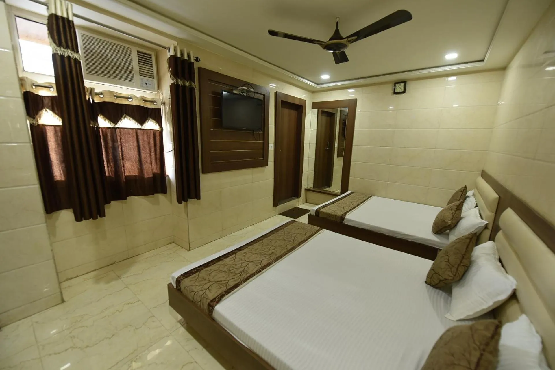Bed in BABA GUEST HOUSE AJMER