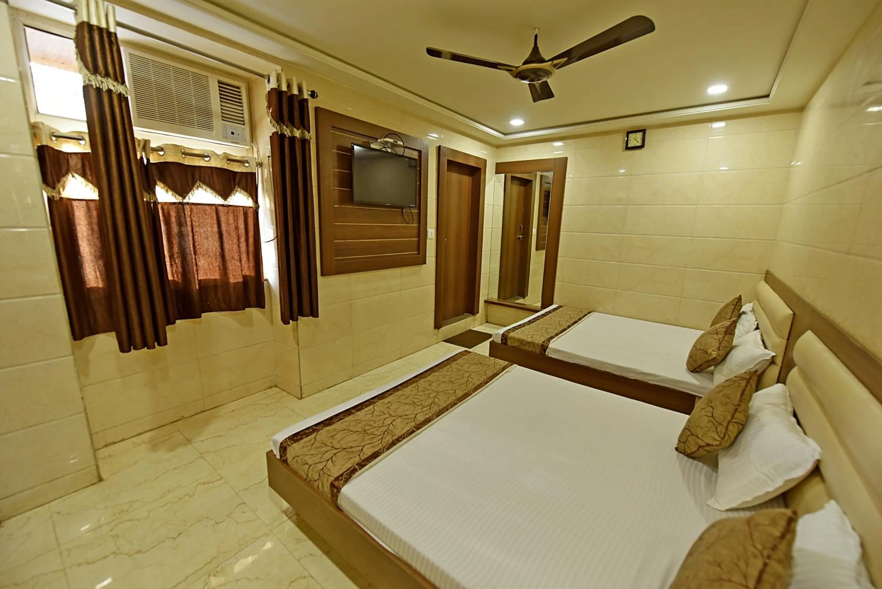 Bed in BABA GUEST HOUSE AJMER