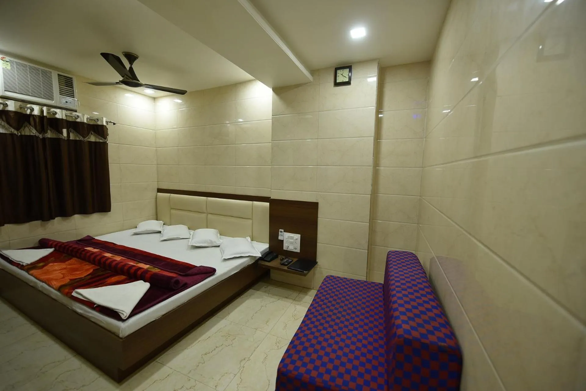 Bed in BABA GUEST HOUSE AJMER