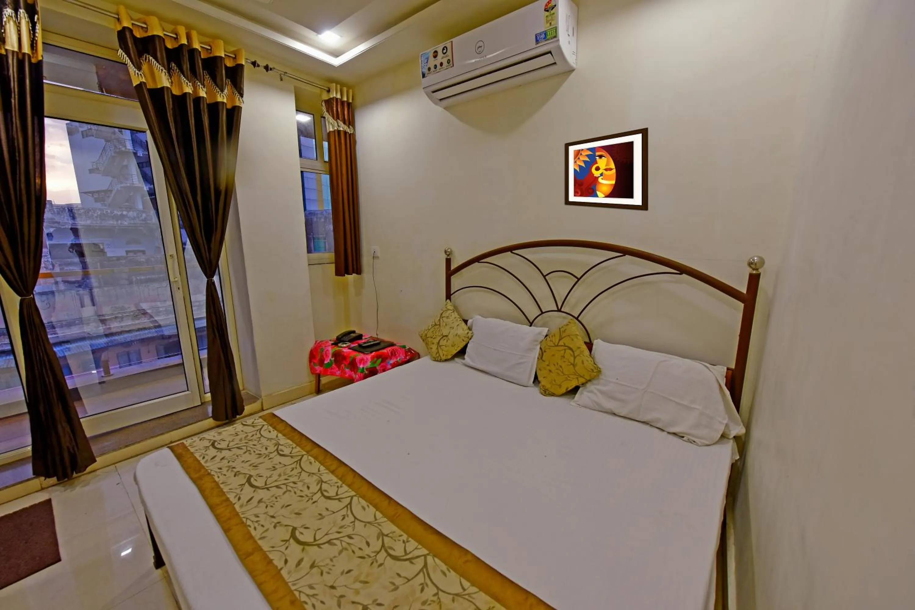 Bed in BABA GUEST HOUSE AJMER