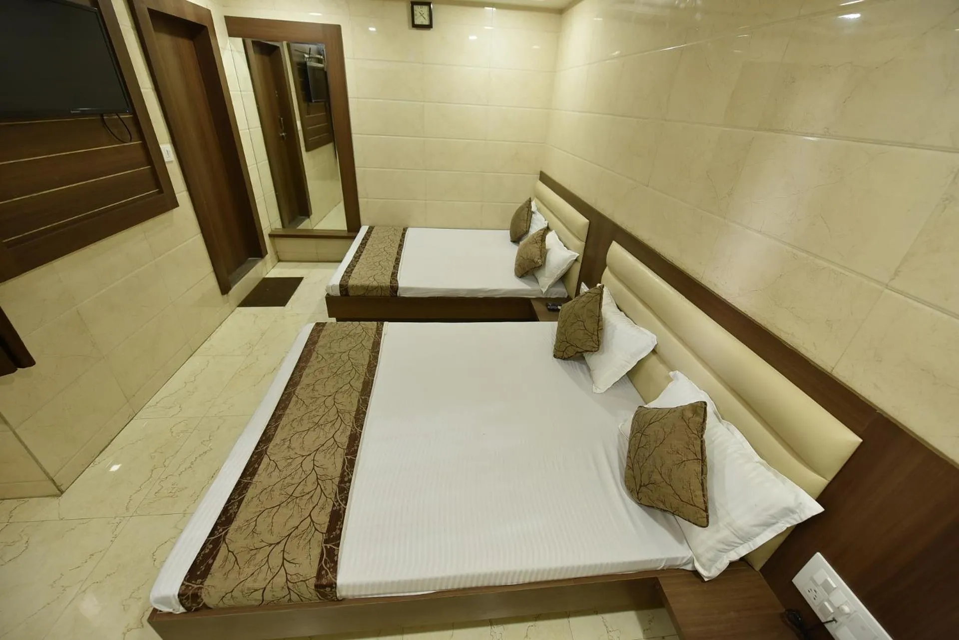 Bed in BABA GUEST HOUSE AJMER