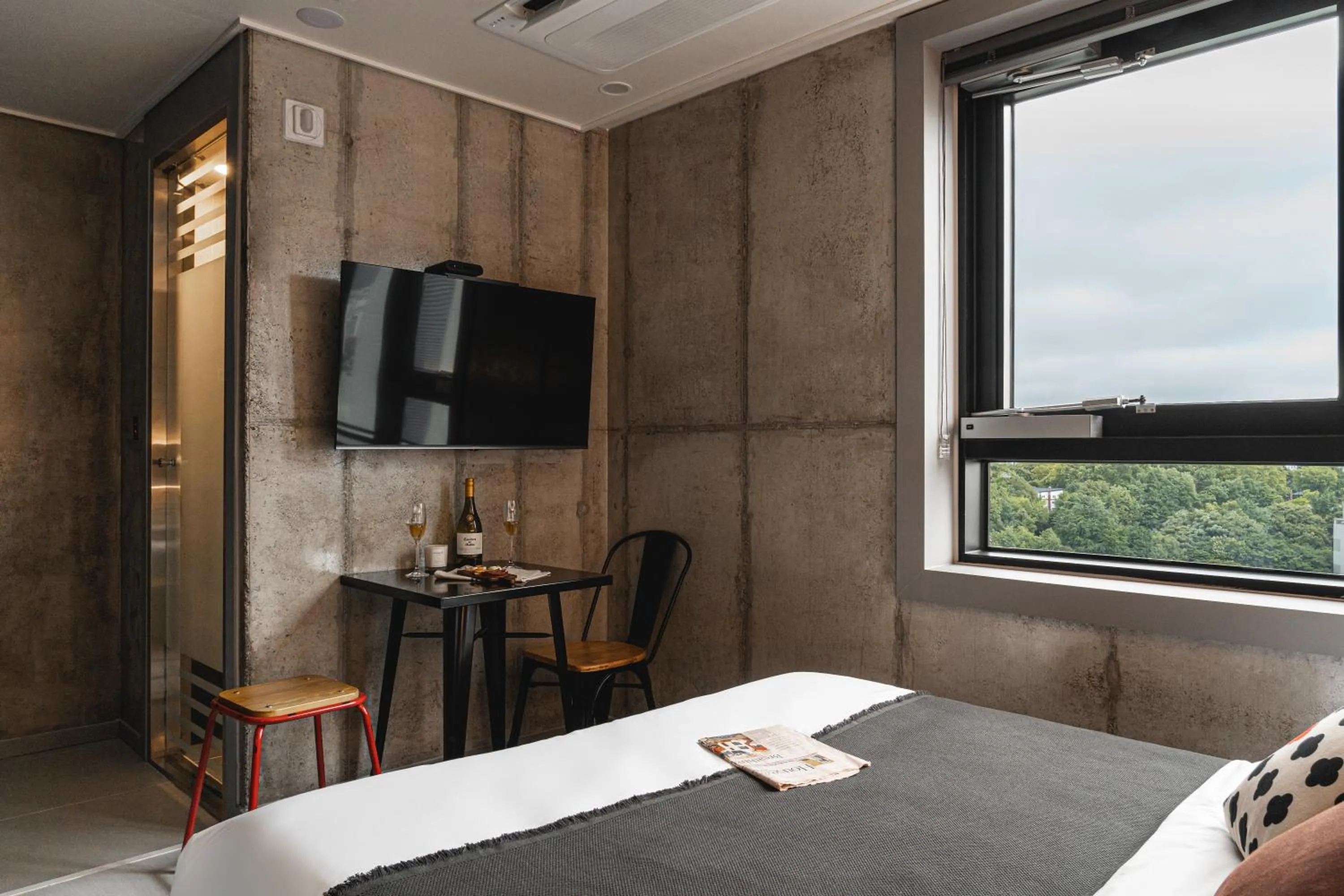 Seating area, Bed in Urbanstay Boutique Nampo BIFF