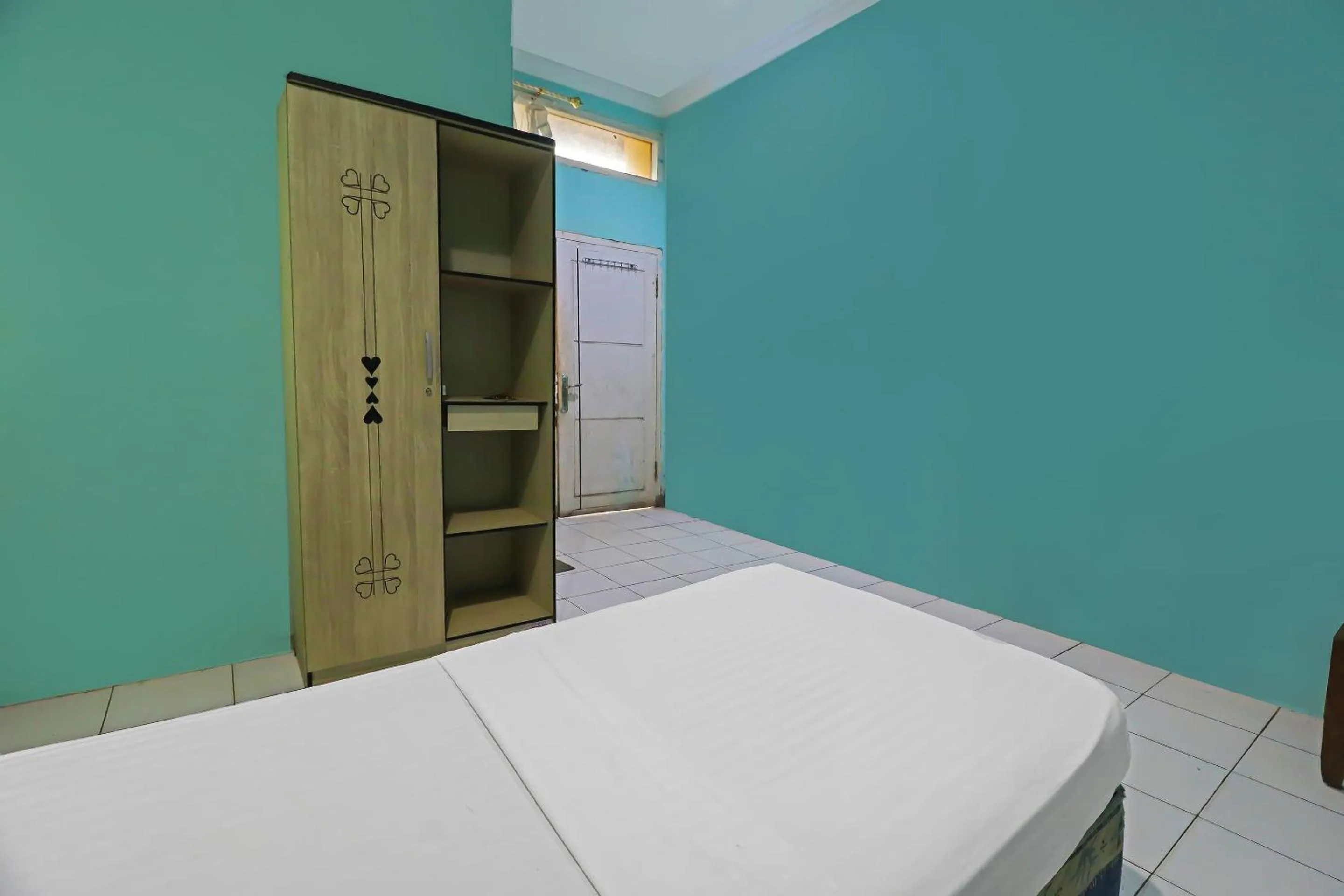 Bedroom in Hotel O Wisma Permata Syariah