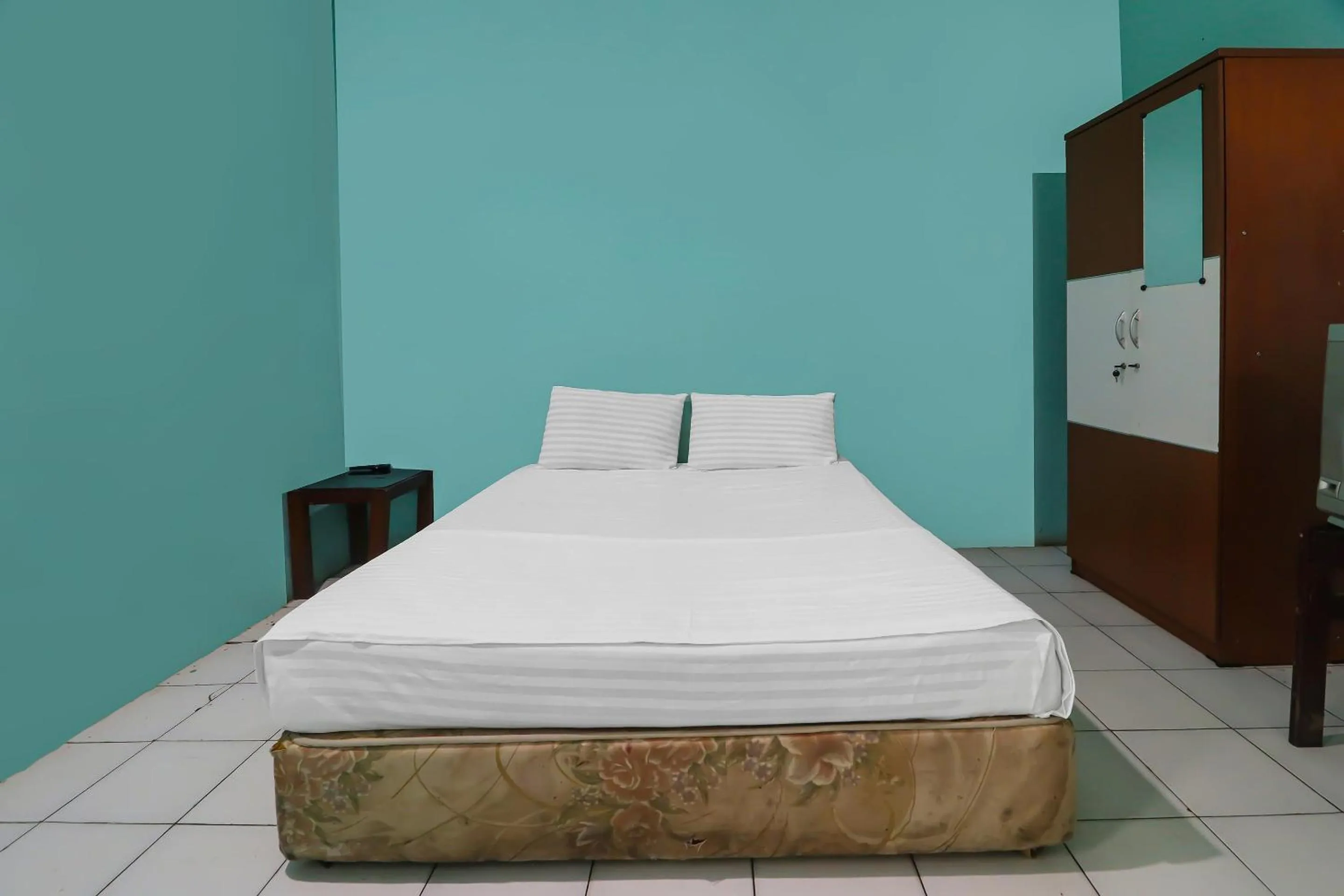 Bedroom in Hotel O Wisma Permata Syariah