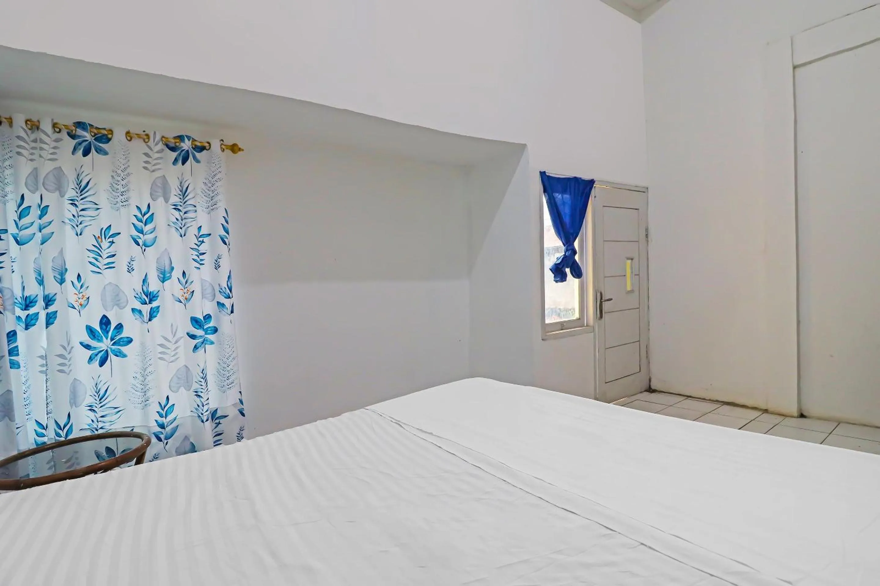 Bedroom in Hotel O Wisma Permata Syariah