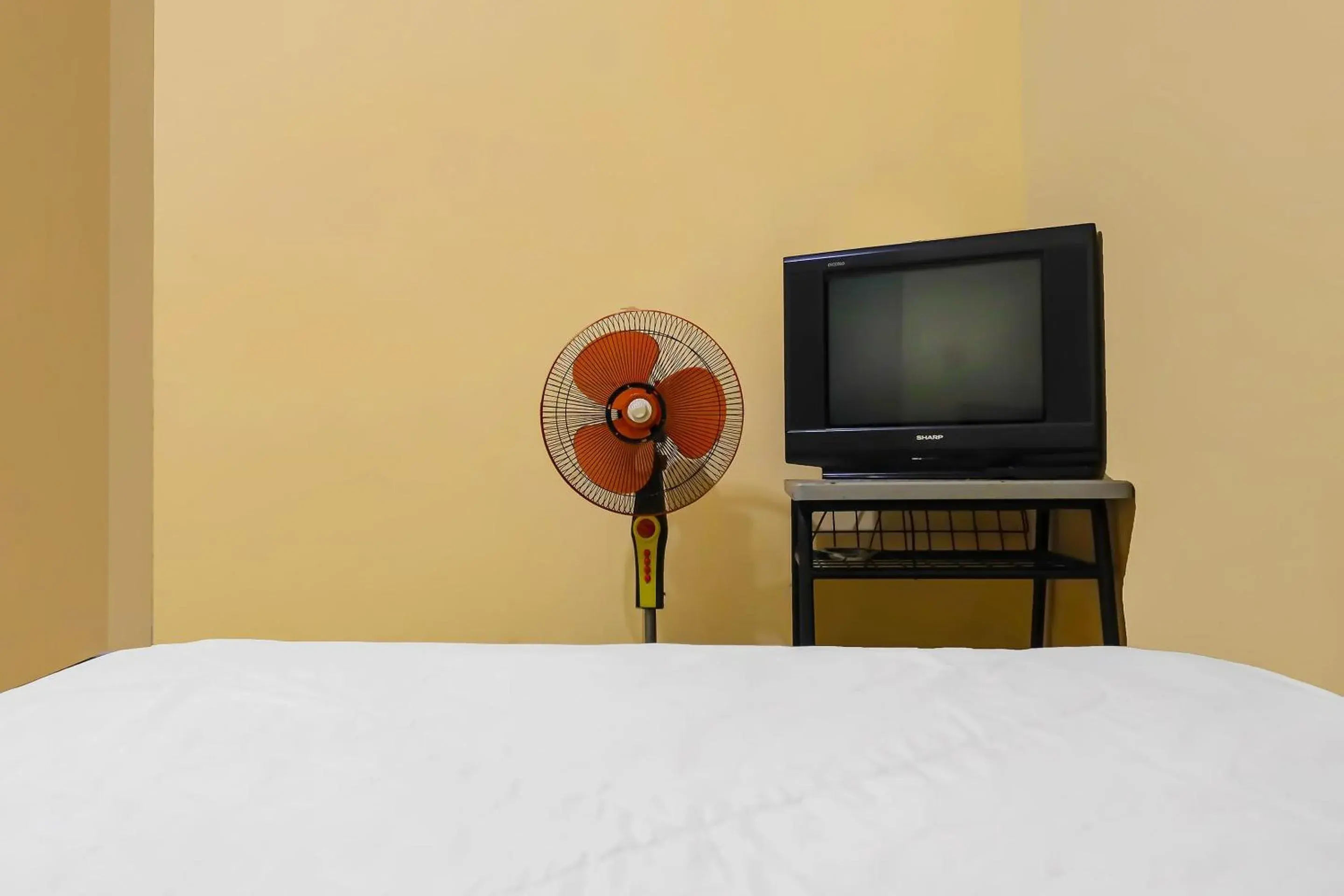 Bedroom in Hotel O Pelita Satu Bedroom in Hotel O Pelita Satu