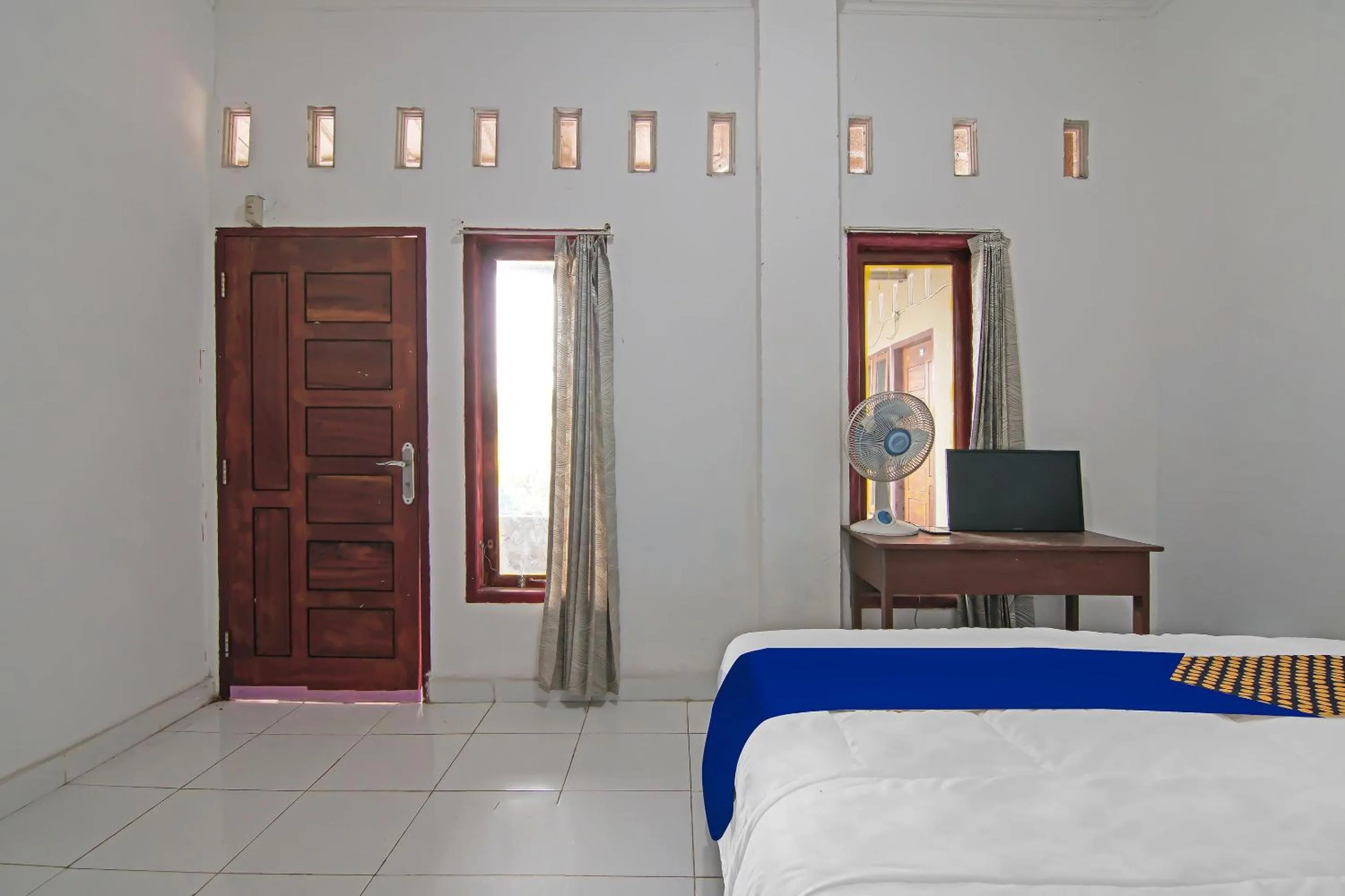 Bedroom in SPOT ON 92498 Fanni Homestay